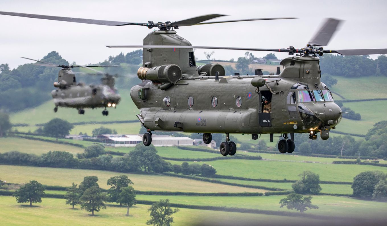 Two Chinooks in flight.