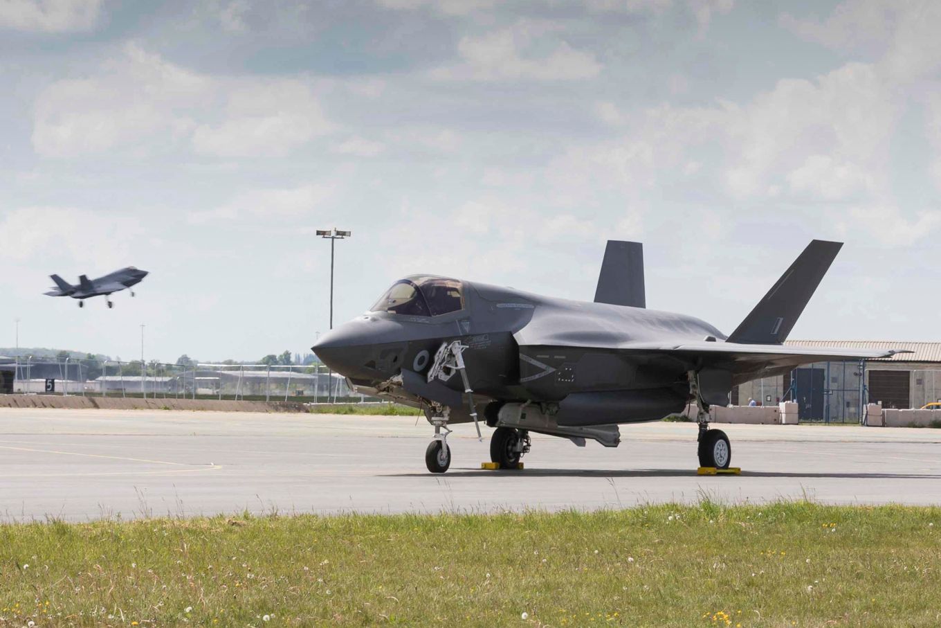 Image shows an RAF F-35 aircraft on the ground.