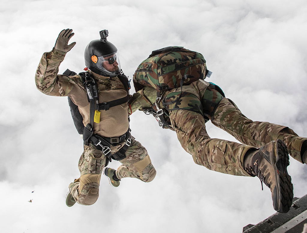 Flight Sergeant Mark Clayton, the new RAF Falcons Parachute Display Team Coach for the 2026 display season, exiting an aircraft with a companion freefall parachutist.