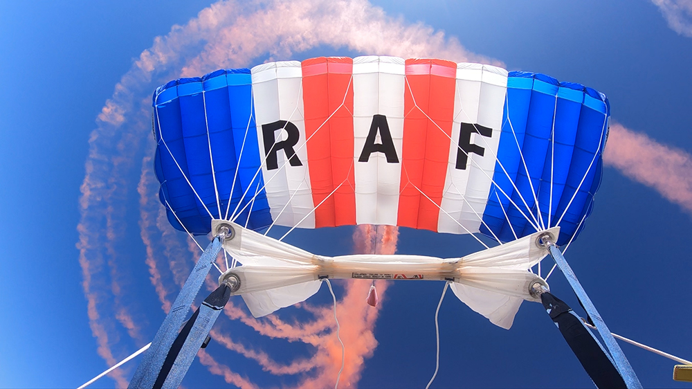 Decoration - Photo of RAF Falons parachute depicting red, white and bands with the initial letters 'RAF'