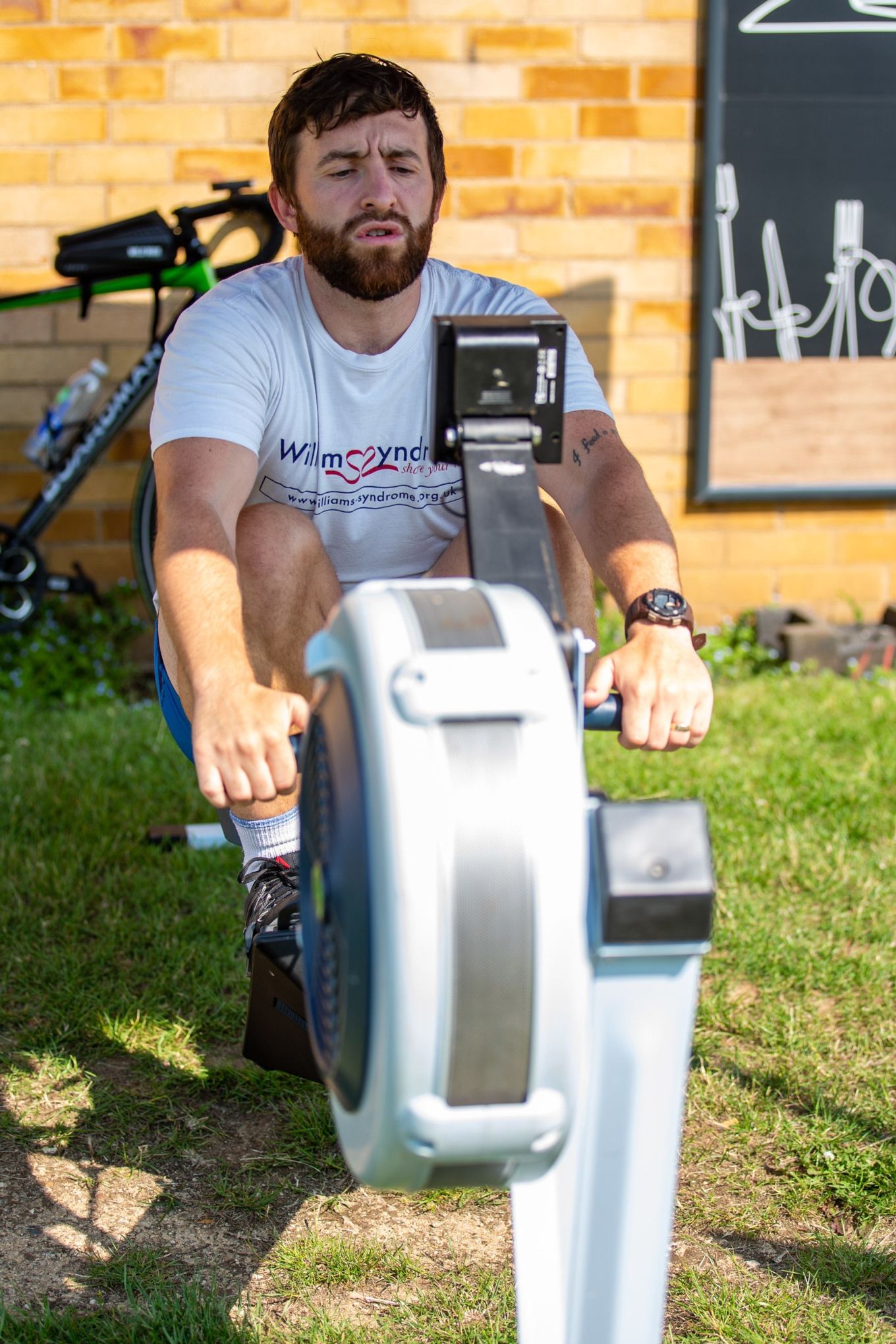 Cpl Dan Gordon on a rowing machine on 24 June