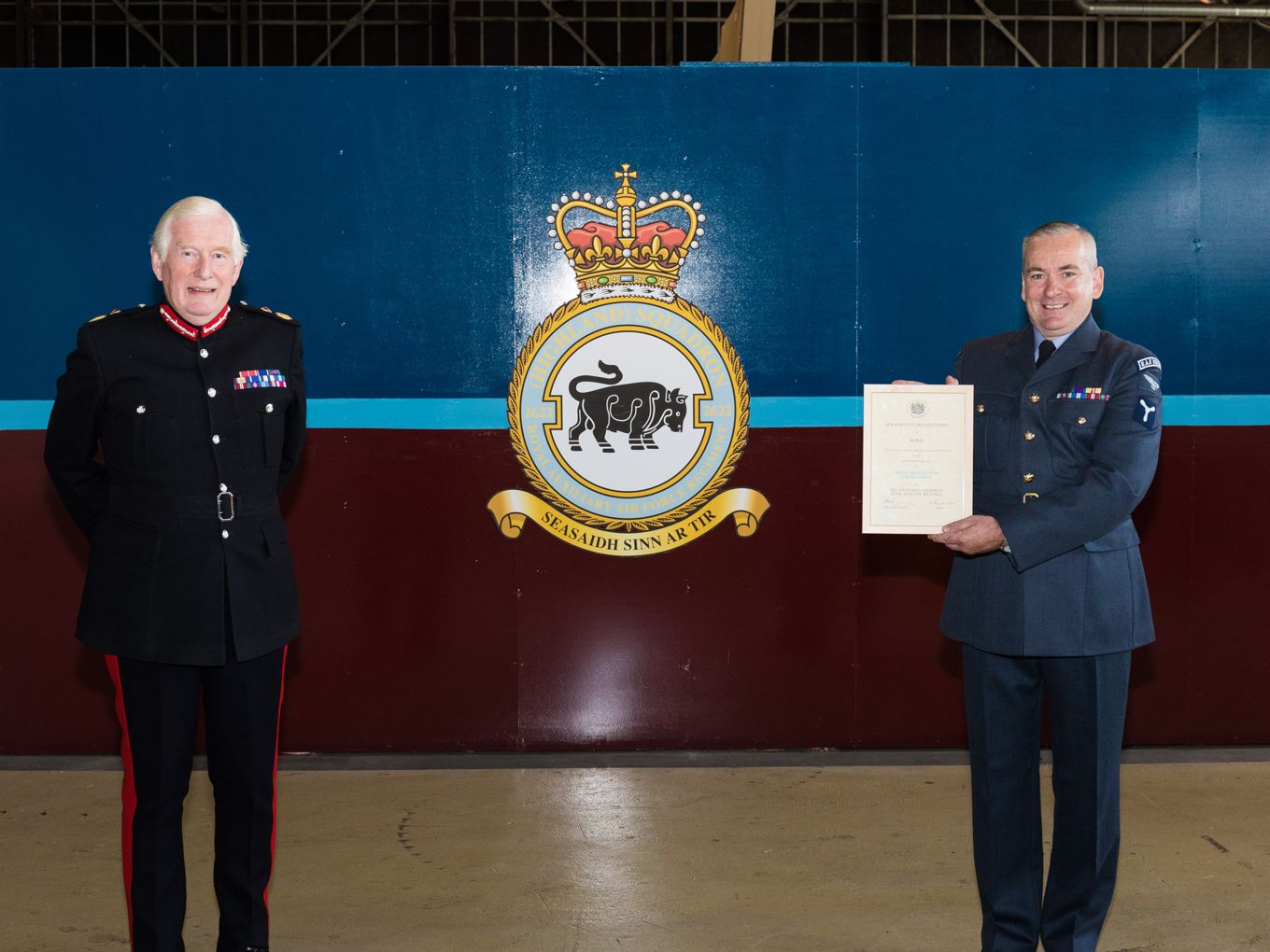 SAC Imlah is presented with his award by the Lord-Lieutenant of Moray, Major General Seymour Munro.