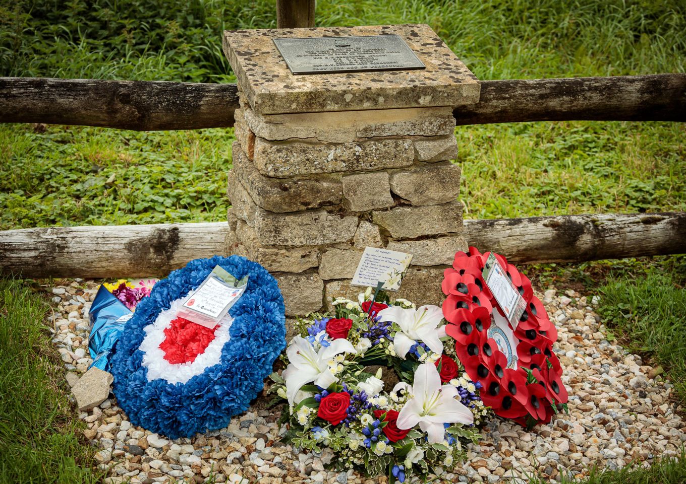 Wreaths placed around the memorial cairn, commemorating the lives of the Albemarle crew