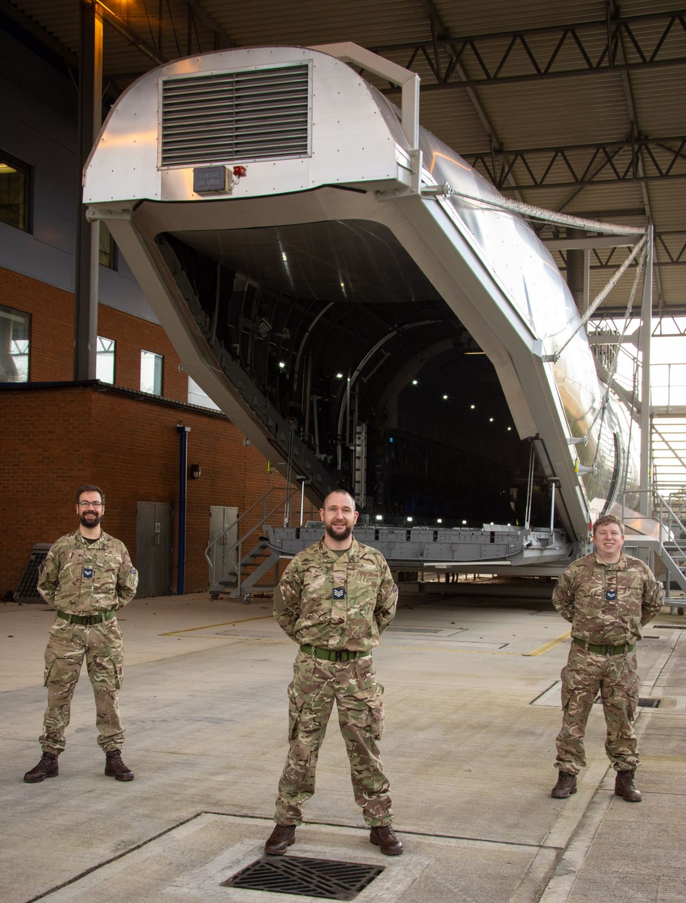 Members of the Maintenance Training School pictured in front of the CHTE at XXIV Squadron
