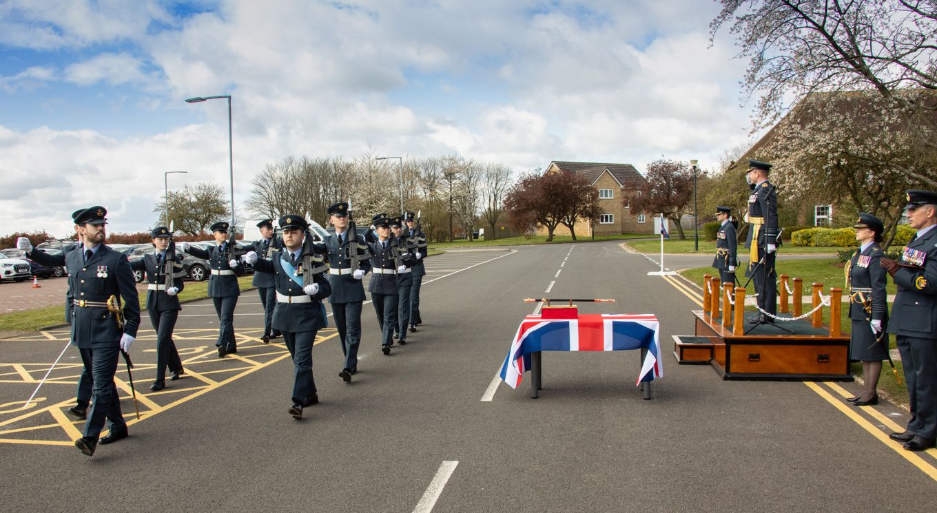 The parade march past the Chief of the Air Staff and military representatives with the Firmin Sword of Peace, whilst Chief of the Air Staff, Air Chief Marshal Sir Mike Wigston KCB CBE ADC takes the salute