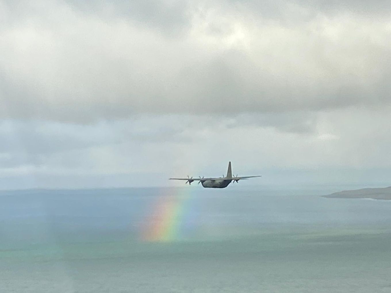 The C-130J Hercules pictured over the sea during one of the sorties