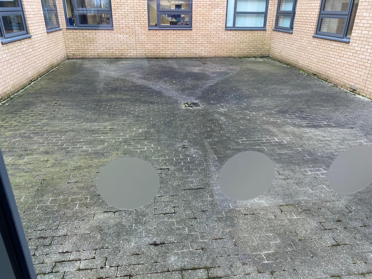 Garden Before - Pictured prior to the renovation work beginning, the disused courtyard located in the centre of Tactical Medical Wing