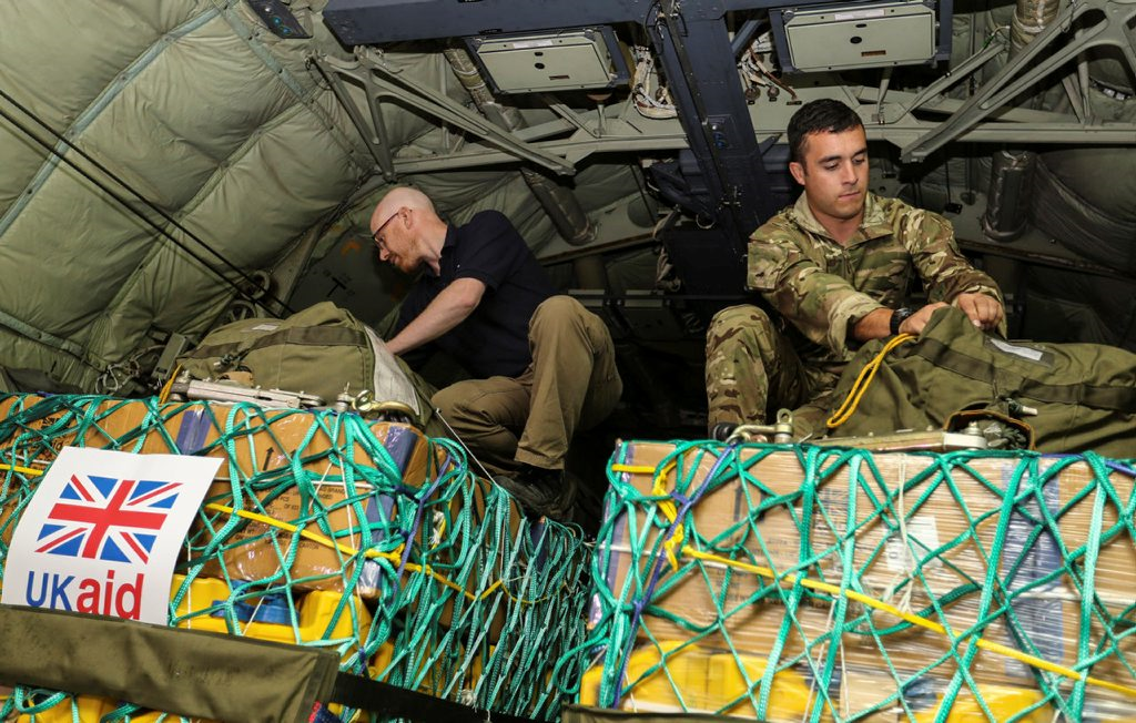 Loading humanitarian aid onto an RAF C-130 Hercules