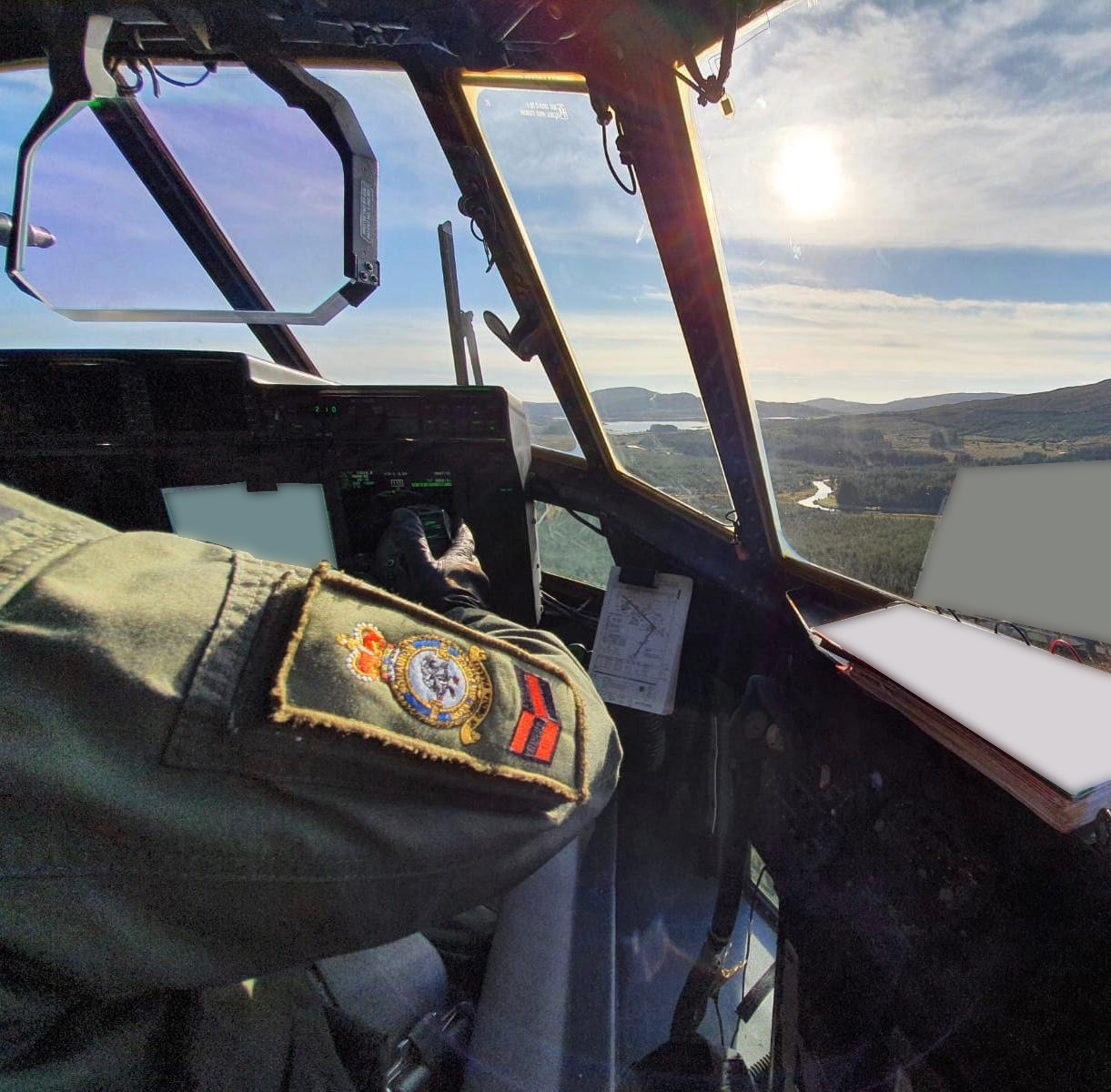 Pictured, XXIV Squadron aircrew flying through the Scottish Highlands during a training sortie