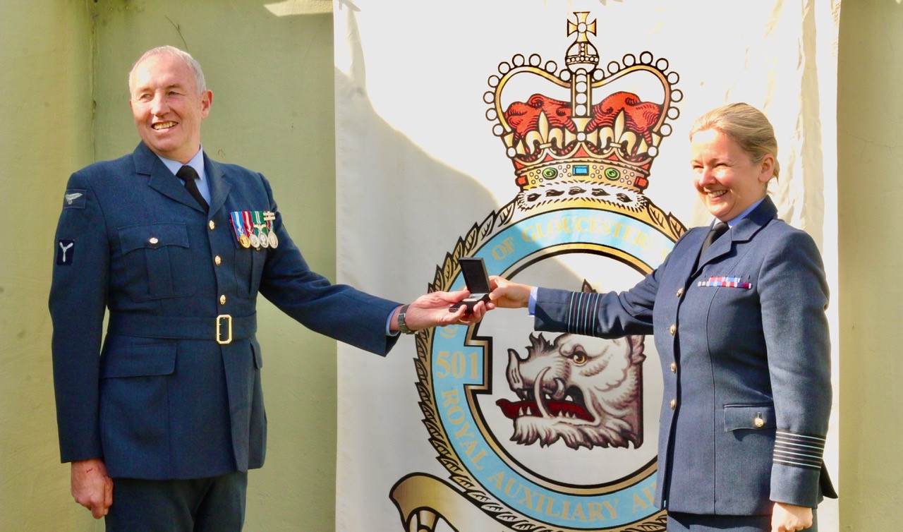 Senior Aircraftman PJ Smith receiving his 3rd Clasp to the Volunteer Reserve Service Medal