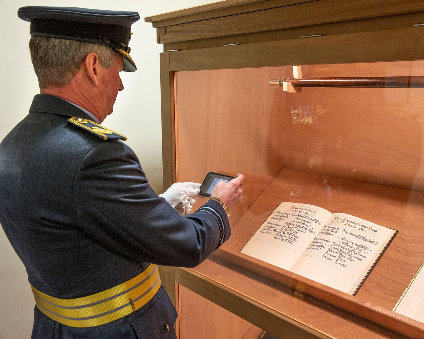 AVM Bethell views the colour book