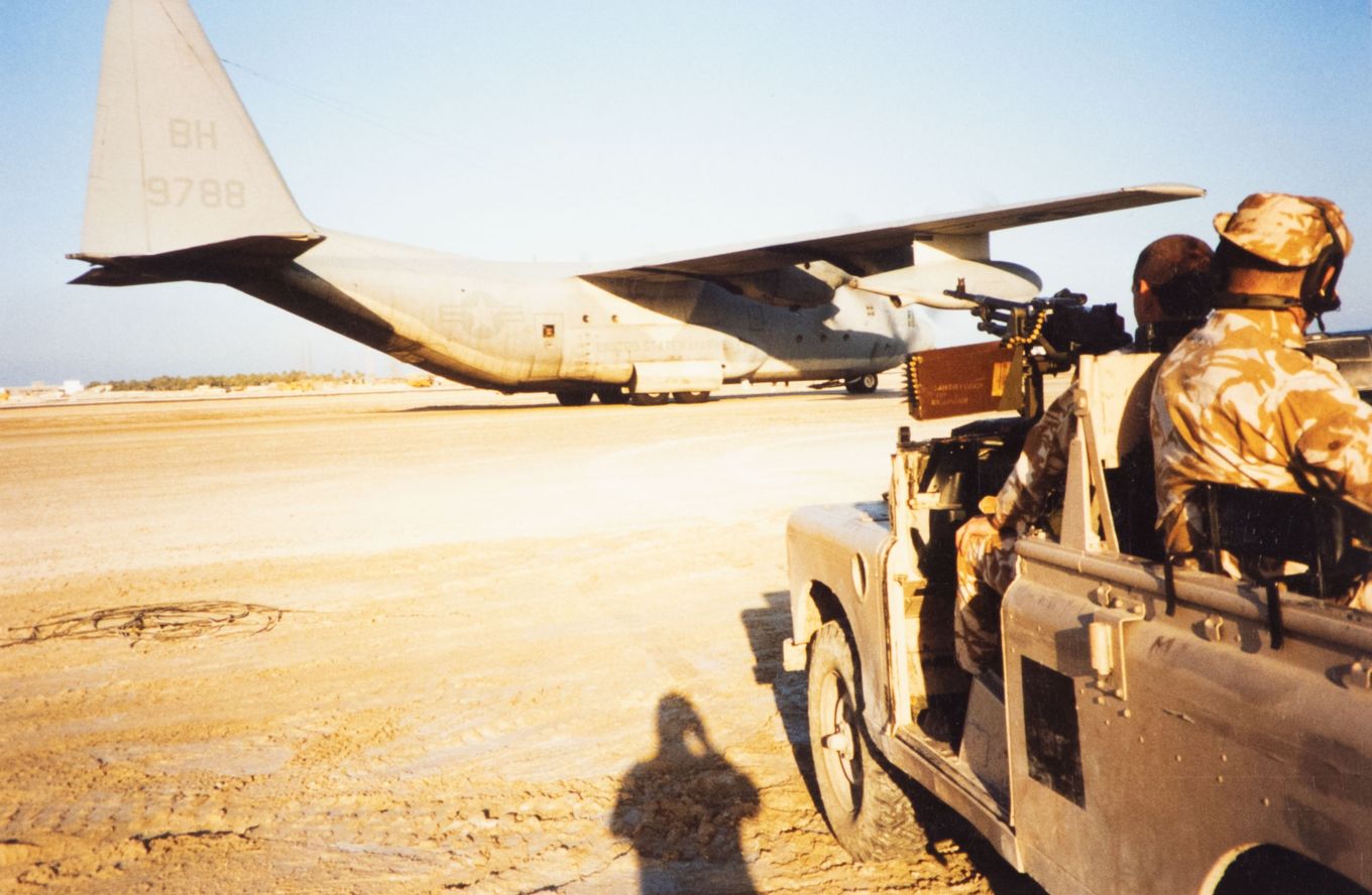 Jan 1991. A 1 Sqn patrol by a USMC C-130 on the Muharraq runway
