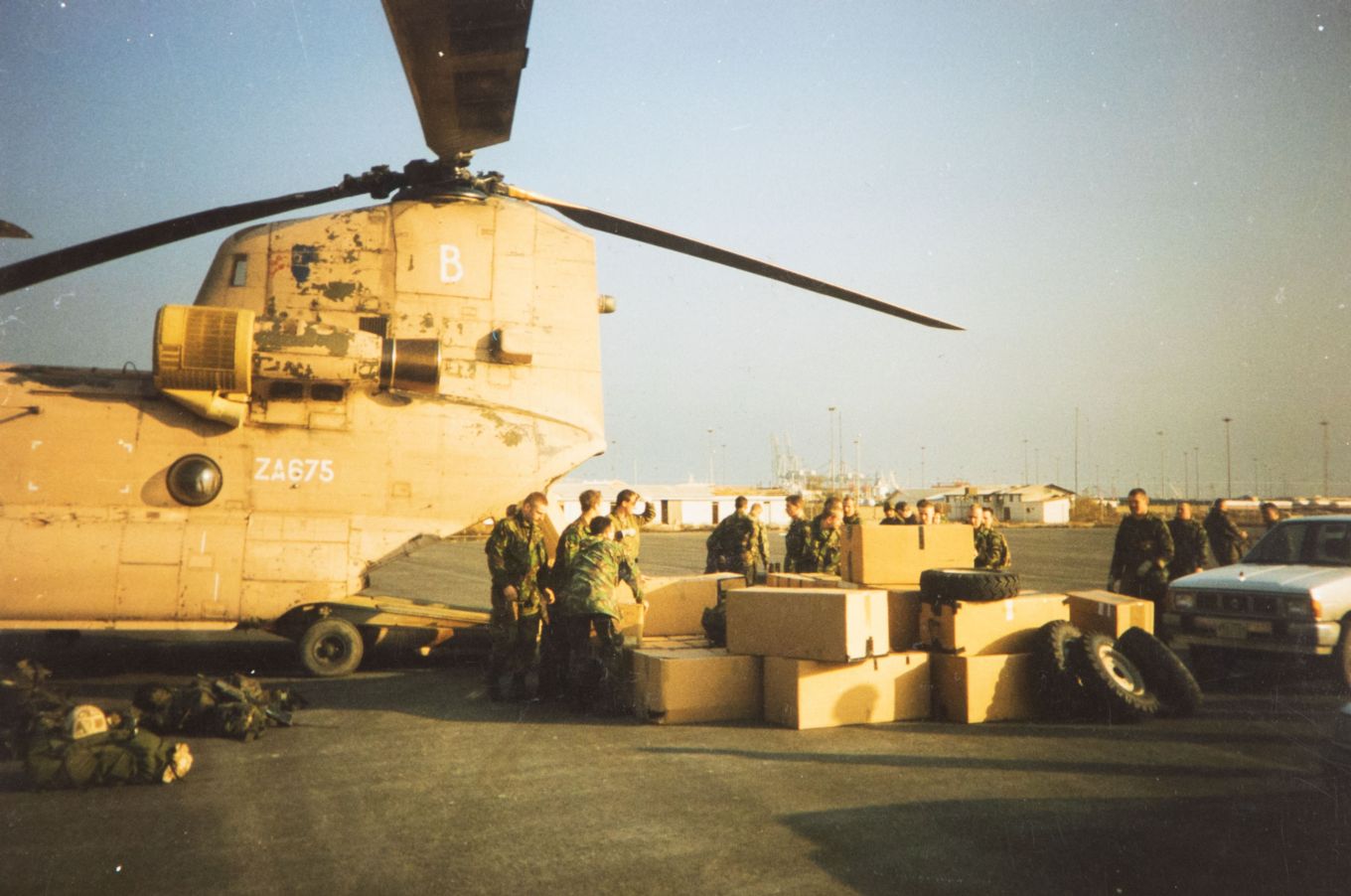 April 1991. Going home. Loading kit on to a Chinook at Al Jubail, Saudi Arabia
