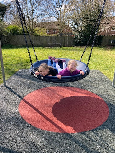 Katy and Lucy demonstrate how to have fun at the new playpark