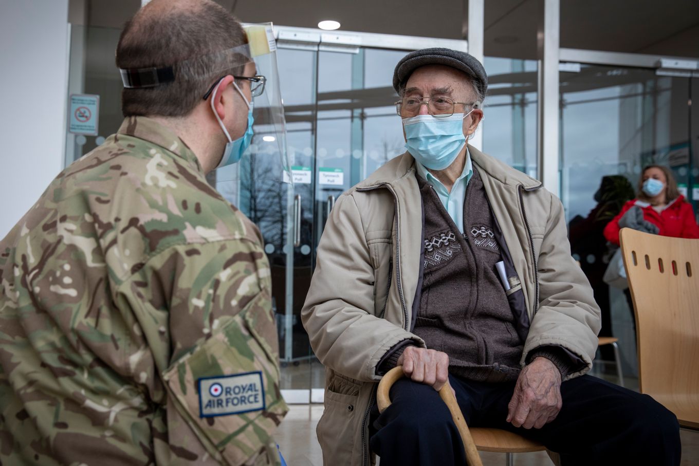 1. Corporal Page chatting with the public after their inoculation.