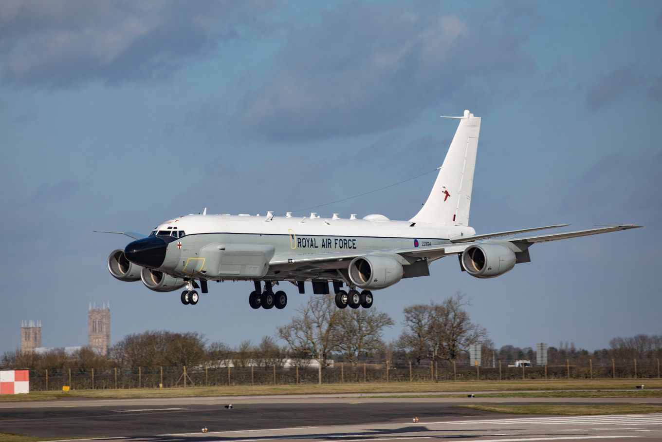 Image shows RAF Rivet Joint aircraft about to land.