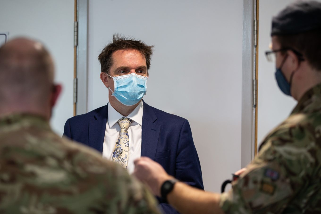 Headteacher Alastair Anderson in conversation with the team from RAF Wittering