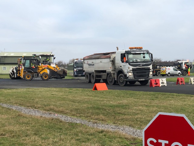 Vehicles laying of the Tarmac
