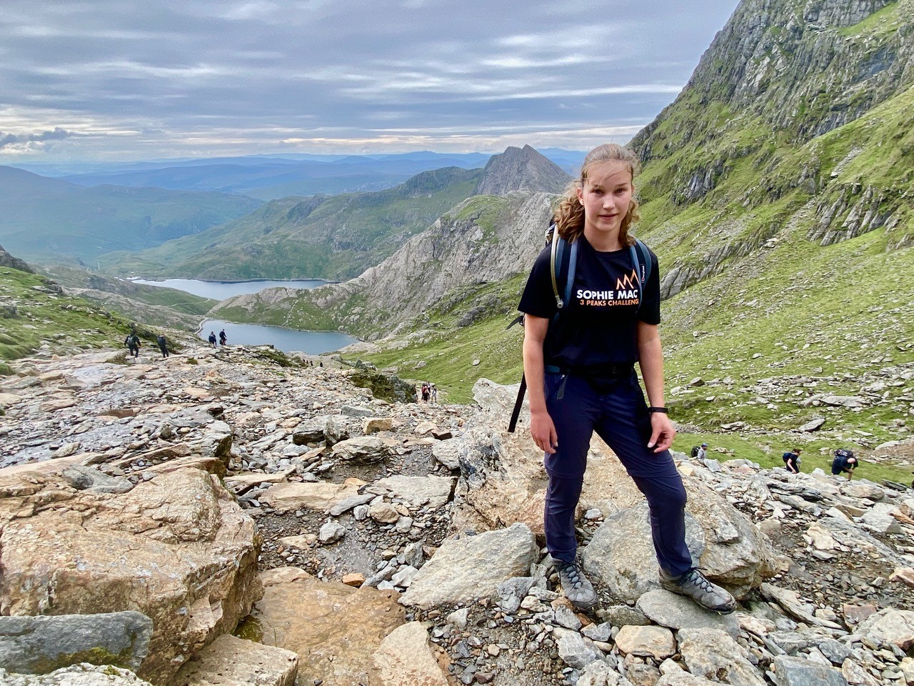 Sophie standing in front of a mountain view