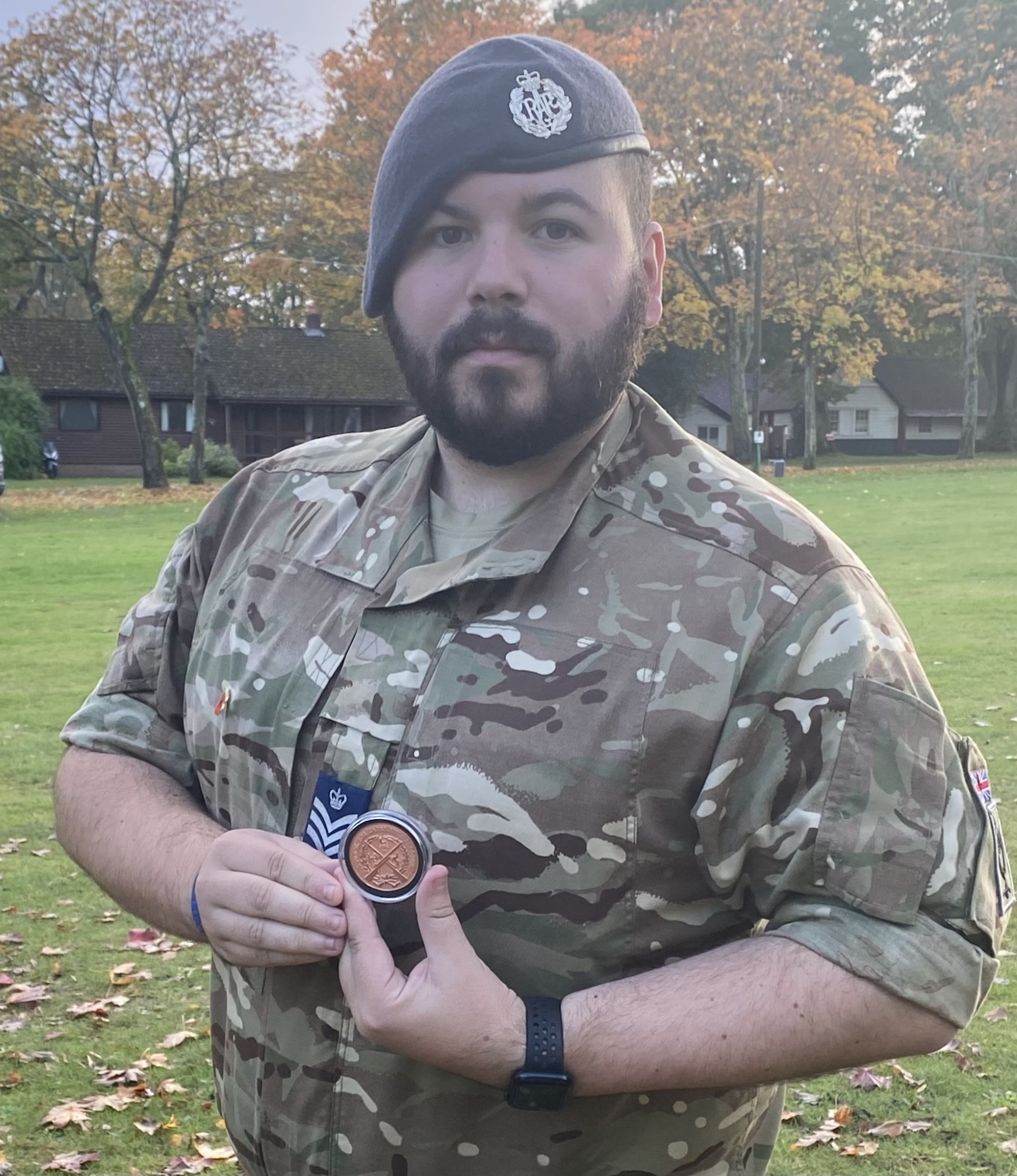 Flight Sergeant Birch with the CCRS Challenge Coin