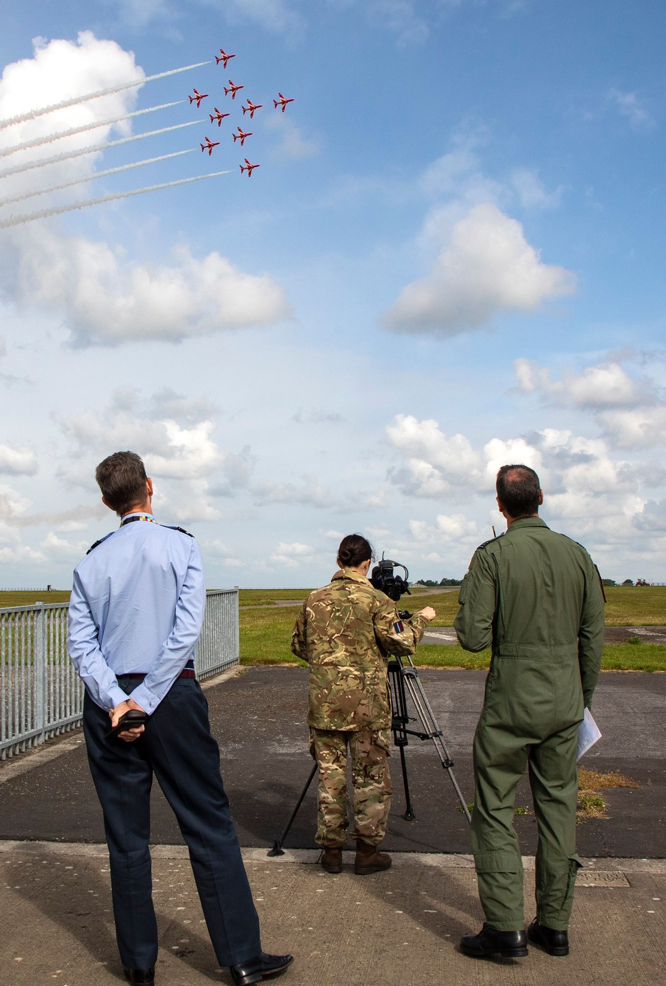 Air Officer Commanding, 22 Group, Air Vice-Marshal Warren James, observing the team.