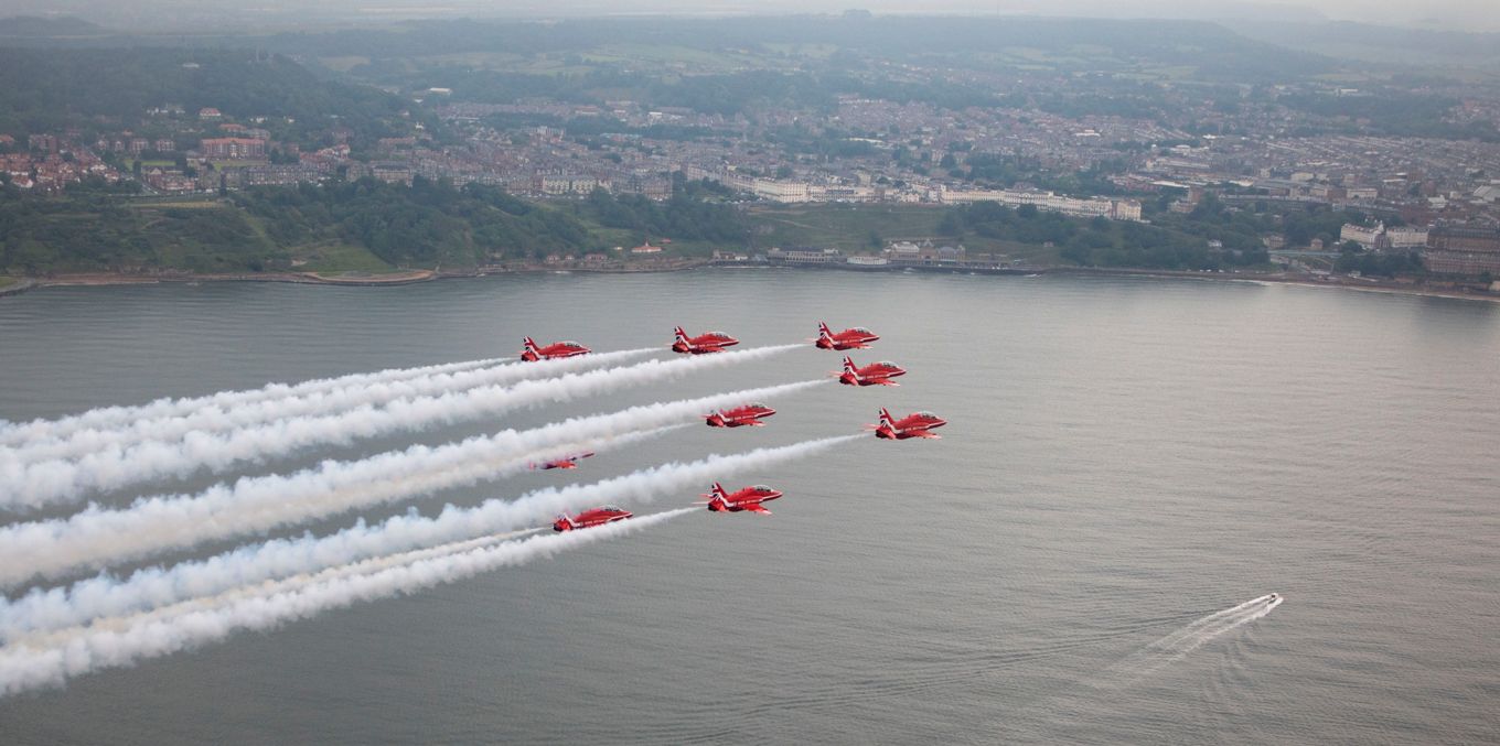 The Red Arrows with Scarborough's coastline. Image by SAC Hannah Smoker.