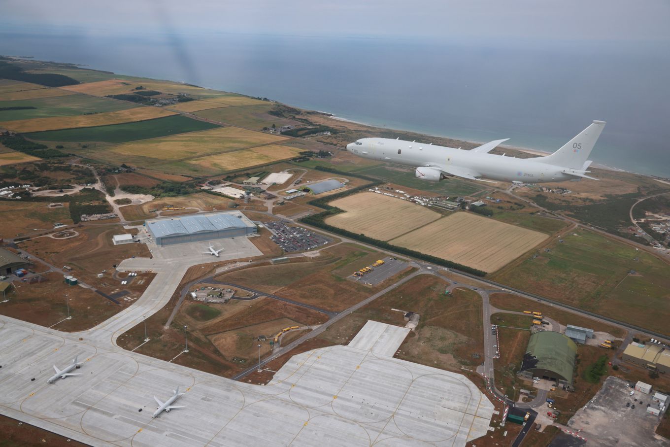 Poseidon in flight over RAF Lossiemouth airfield.