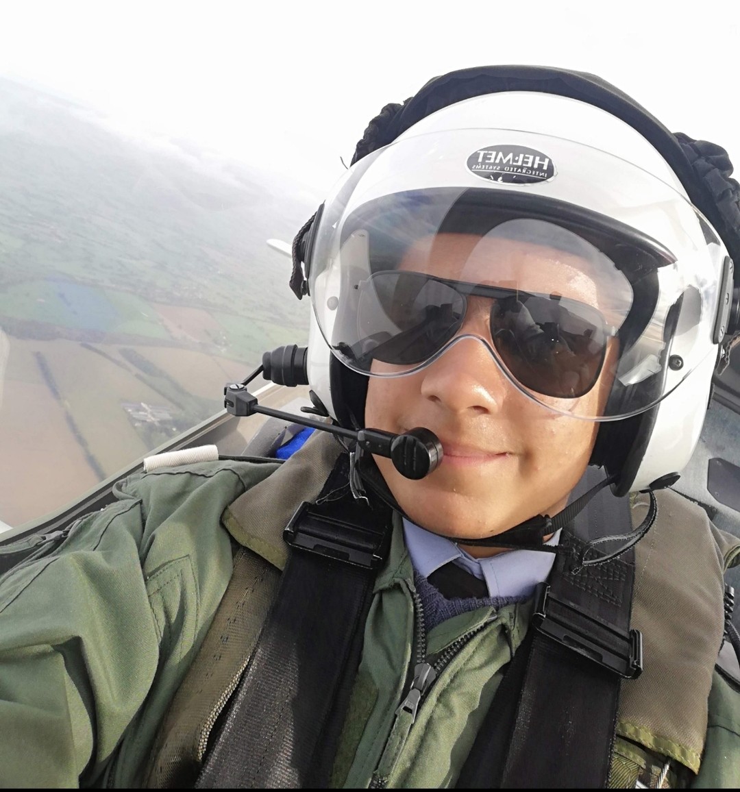 Aslam taking a selfie while flying in the cockpit.