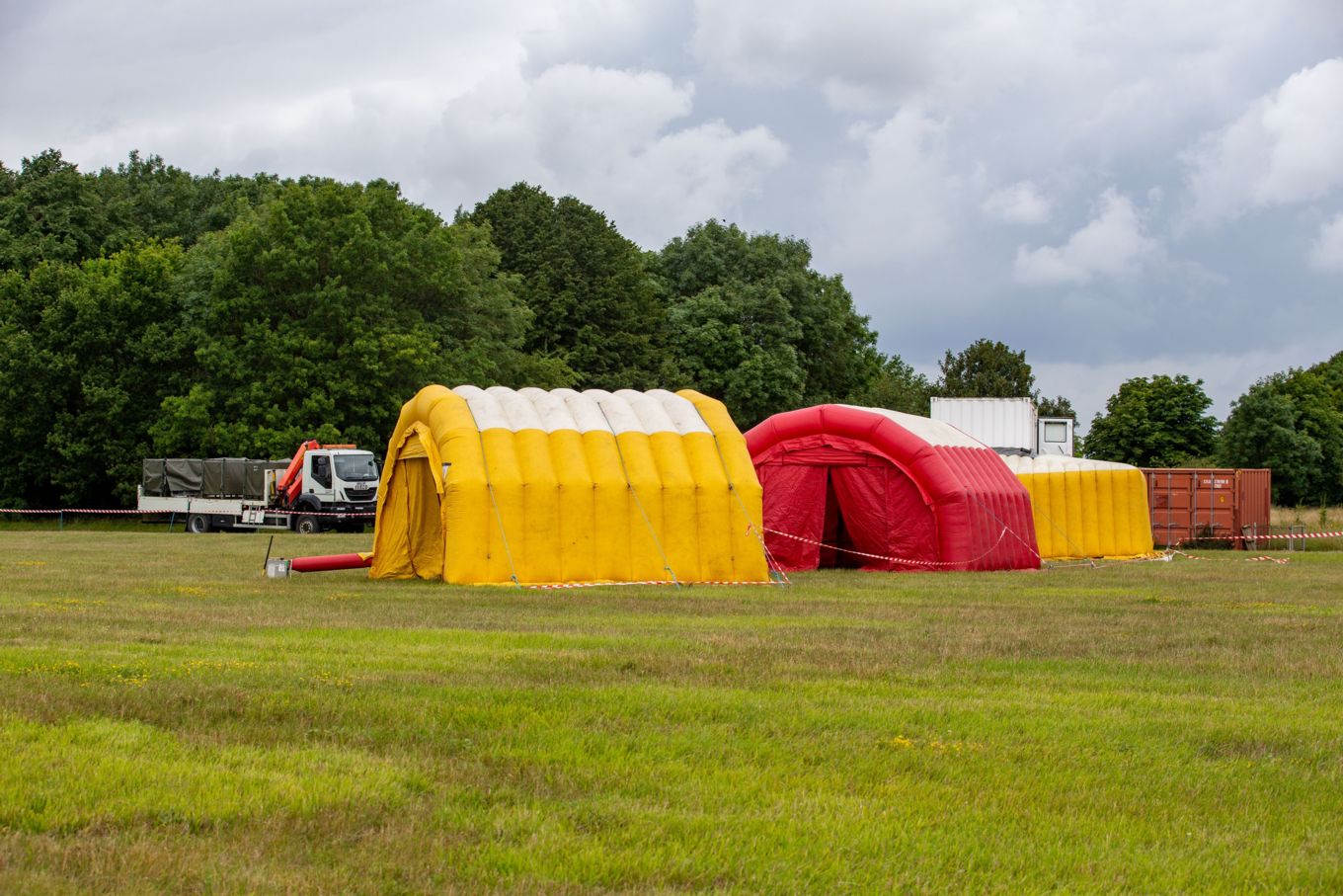 Inflatable tents used to control entry and exit from the crash site