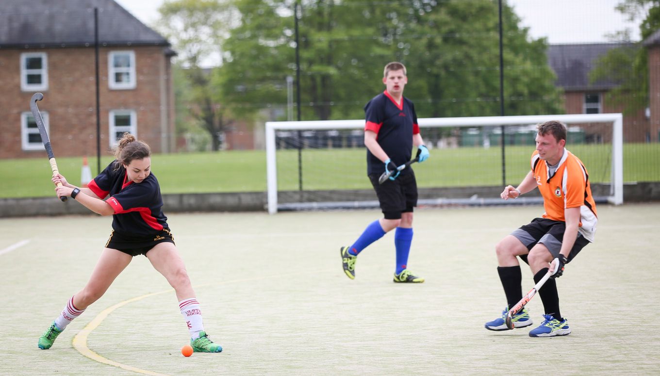 Fg Off Clarke in action in a hockey match against RAF Coningsby