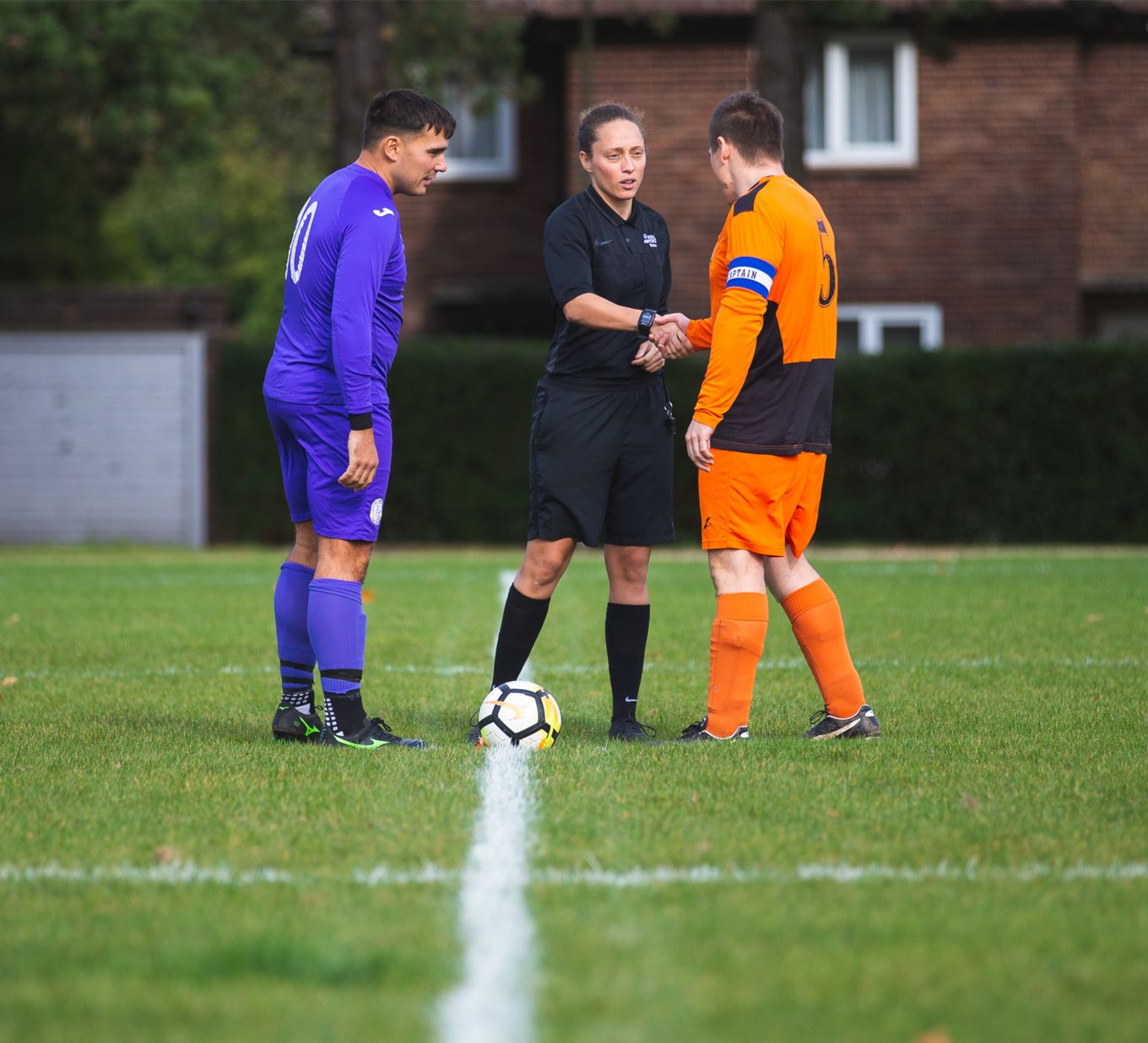 Corporal Lauren Impey refereeing a football match at RAF Wittering
