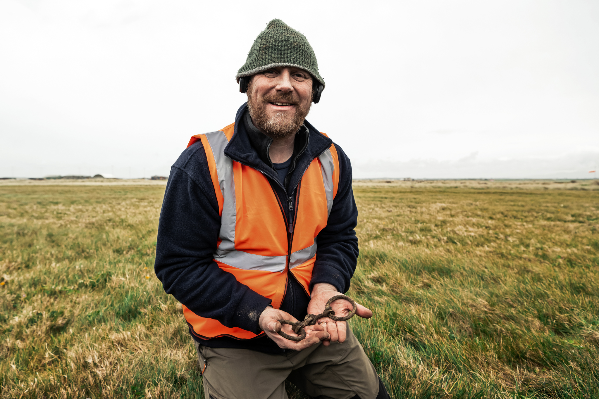 Holding the bridle-bit find.