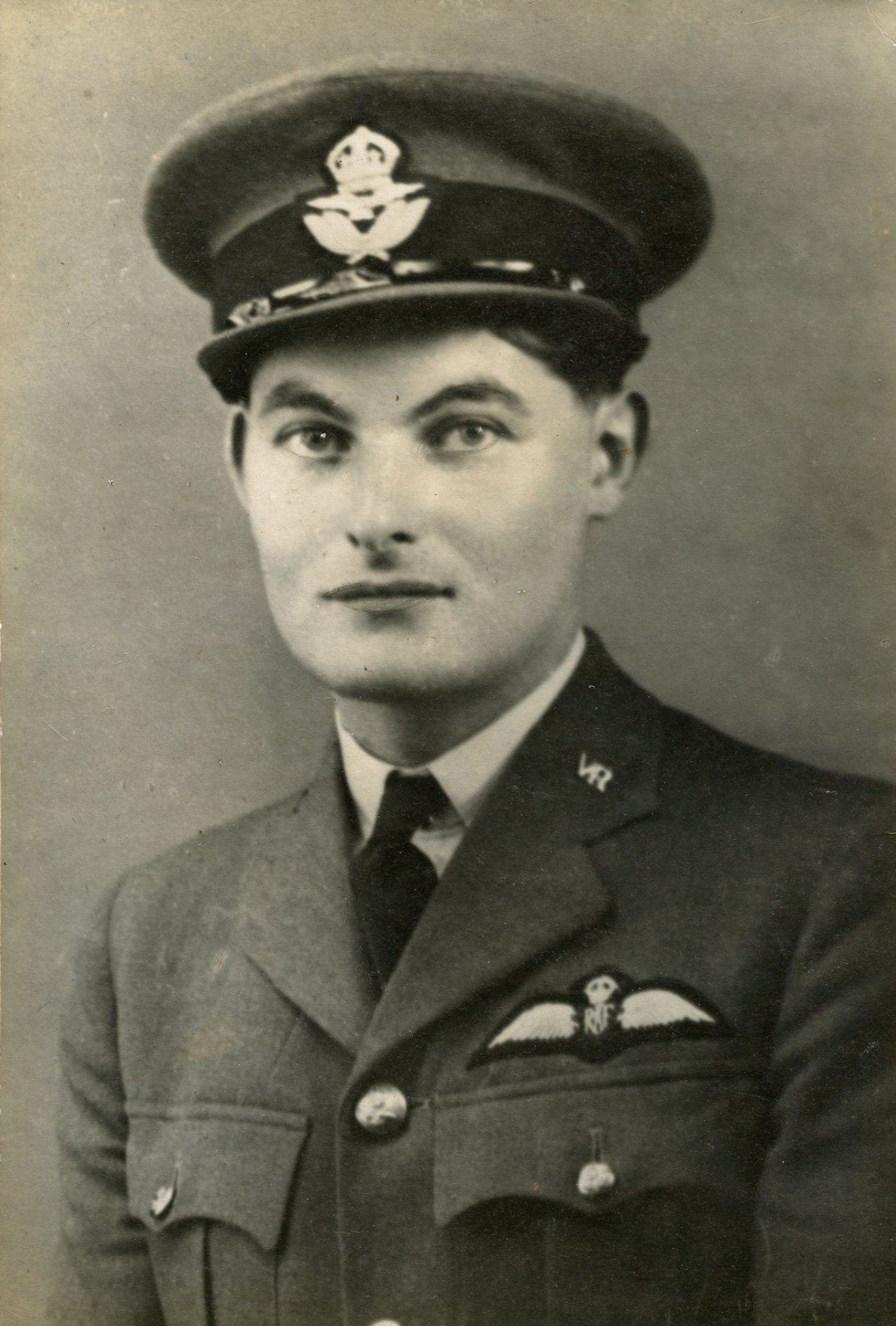Black and white portrait photo of Flight Lieutenant Tilbury