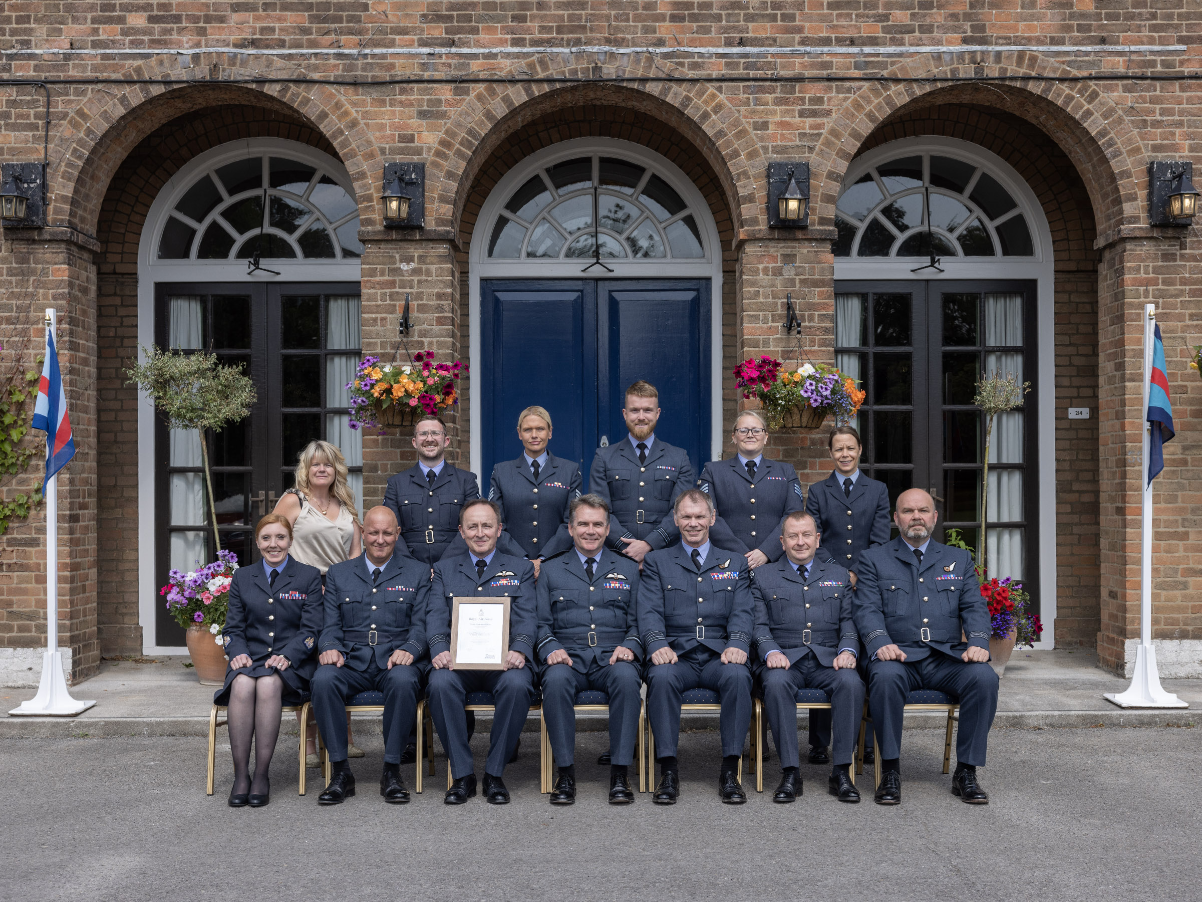 Formal Group photograph of members of the operational training centre with their award