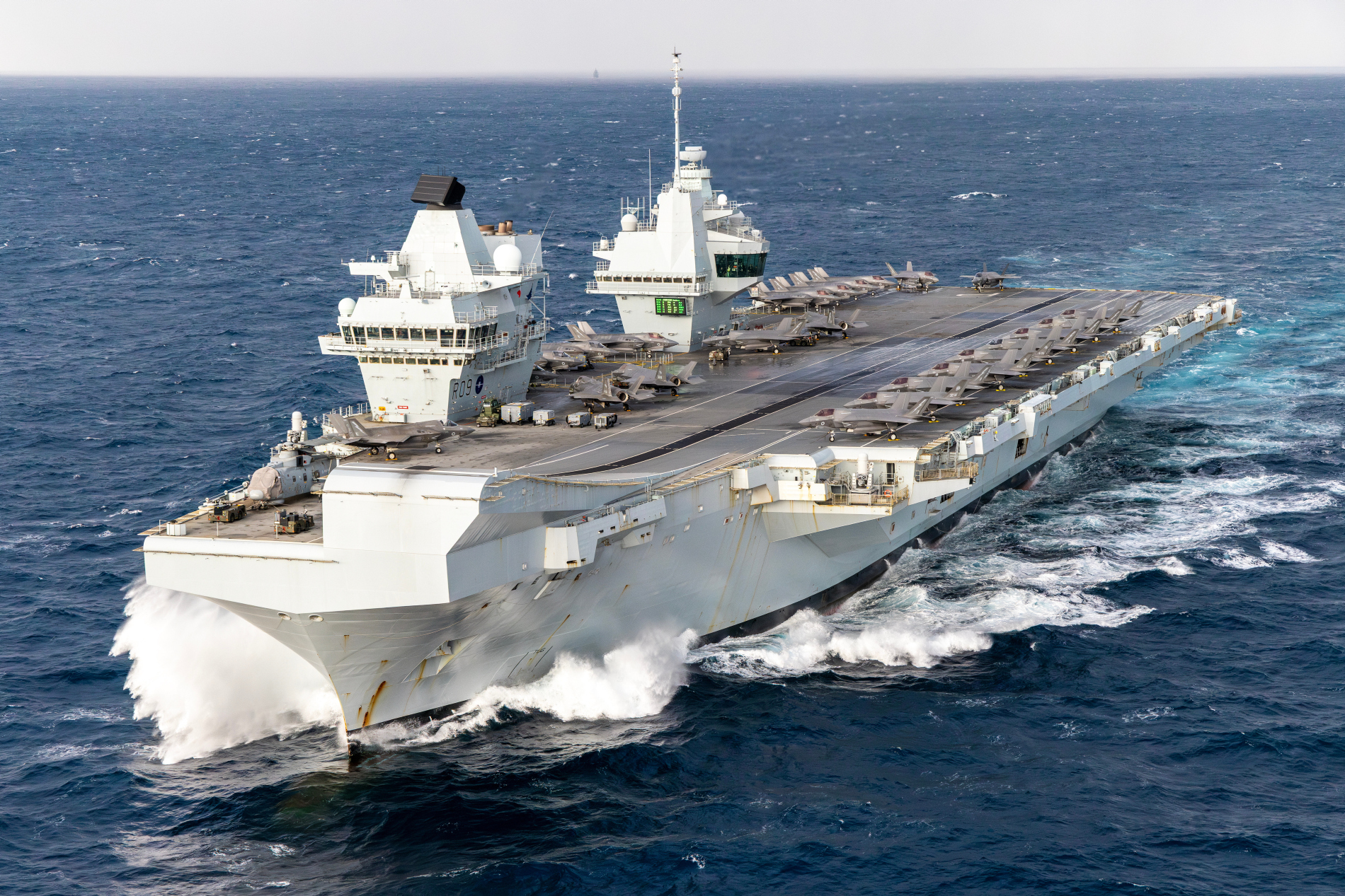 British aircraft carrier at see with F-35Bs on board.