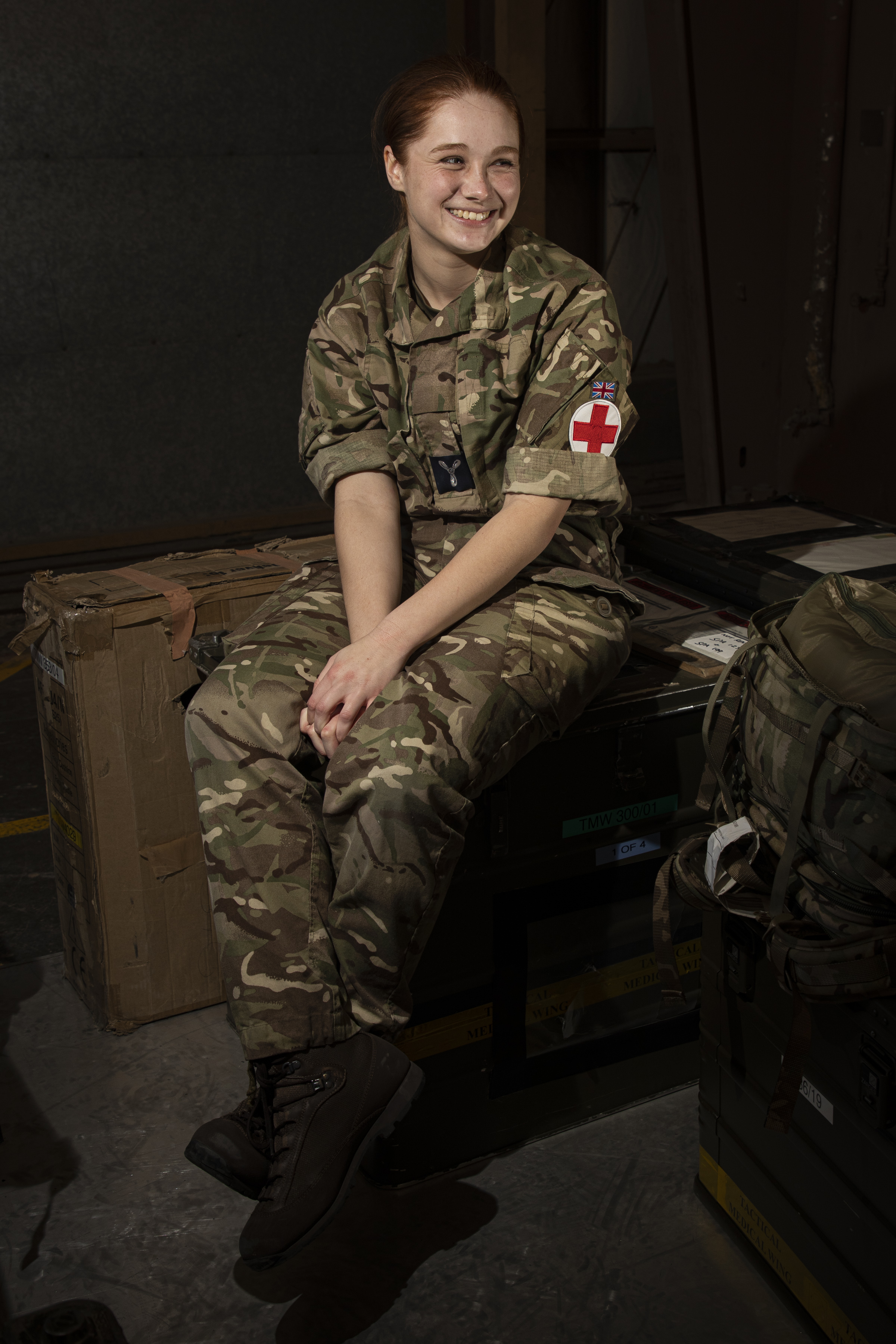 RAF medic sat on crates