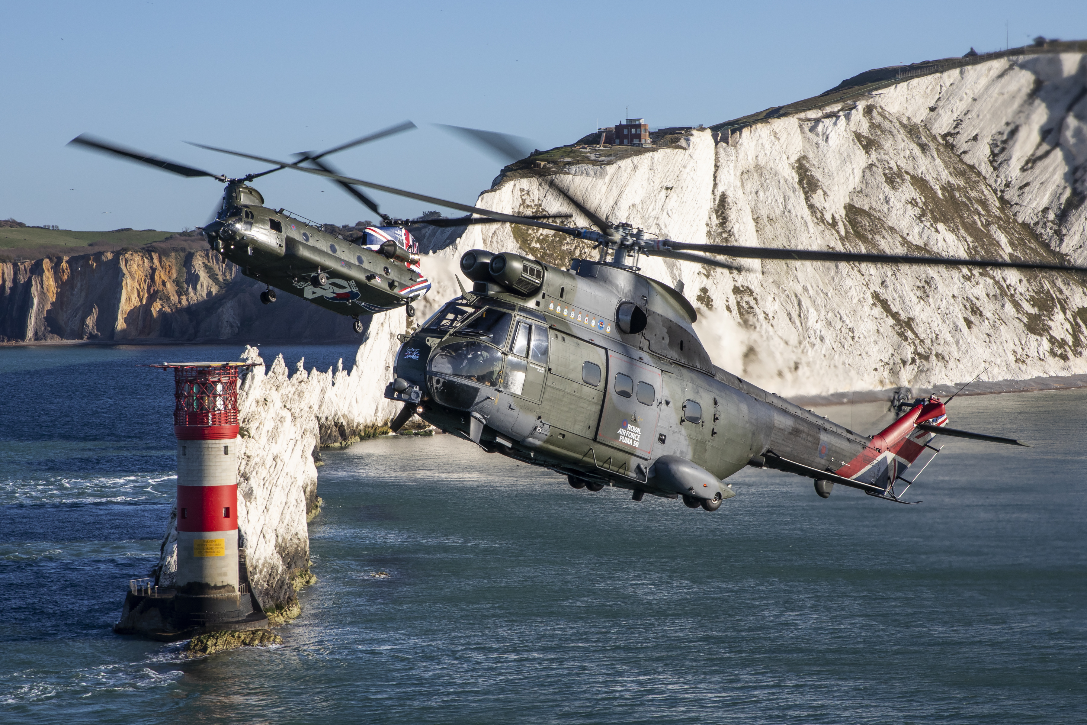 RAF helicopters banking over the white cliffs of dover