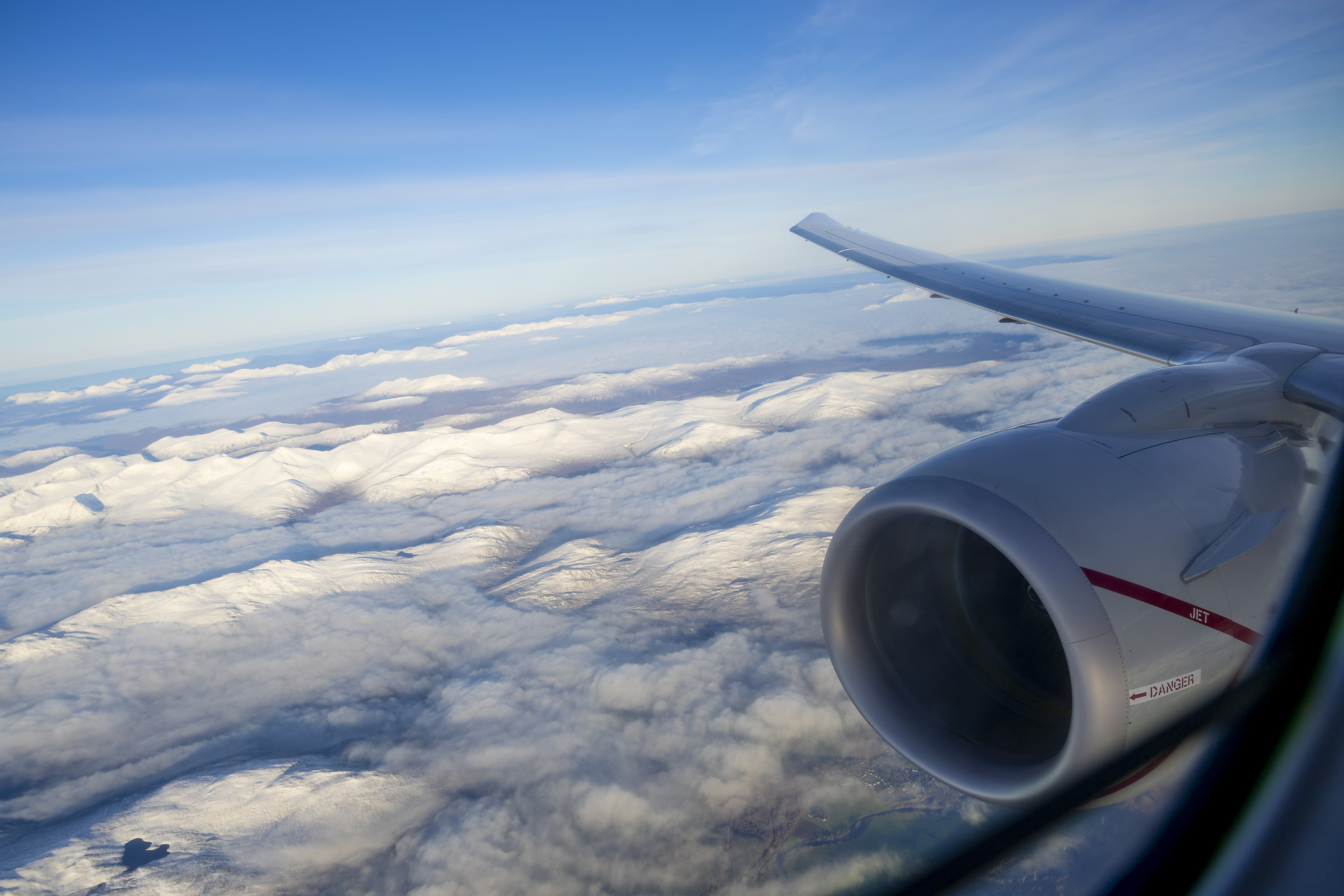 View from the Poseidon flying over clouds.
