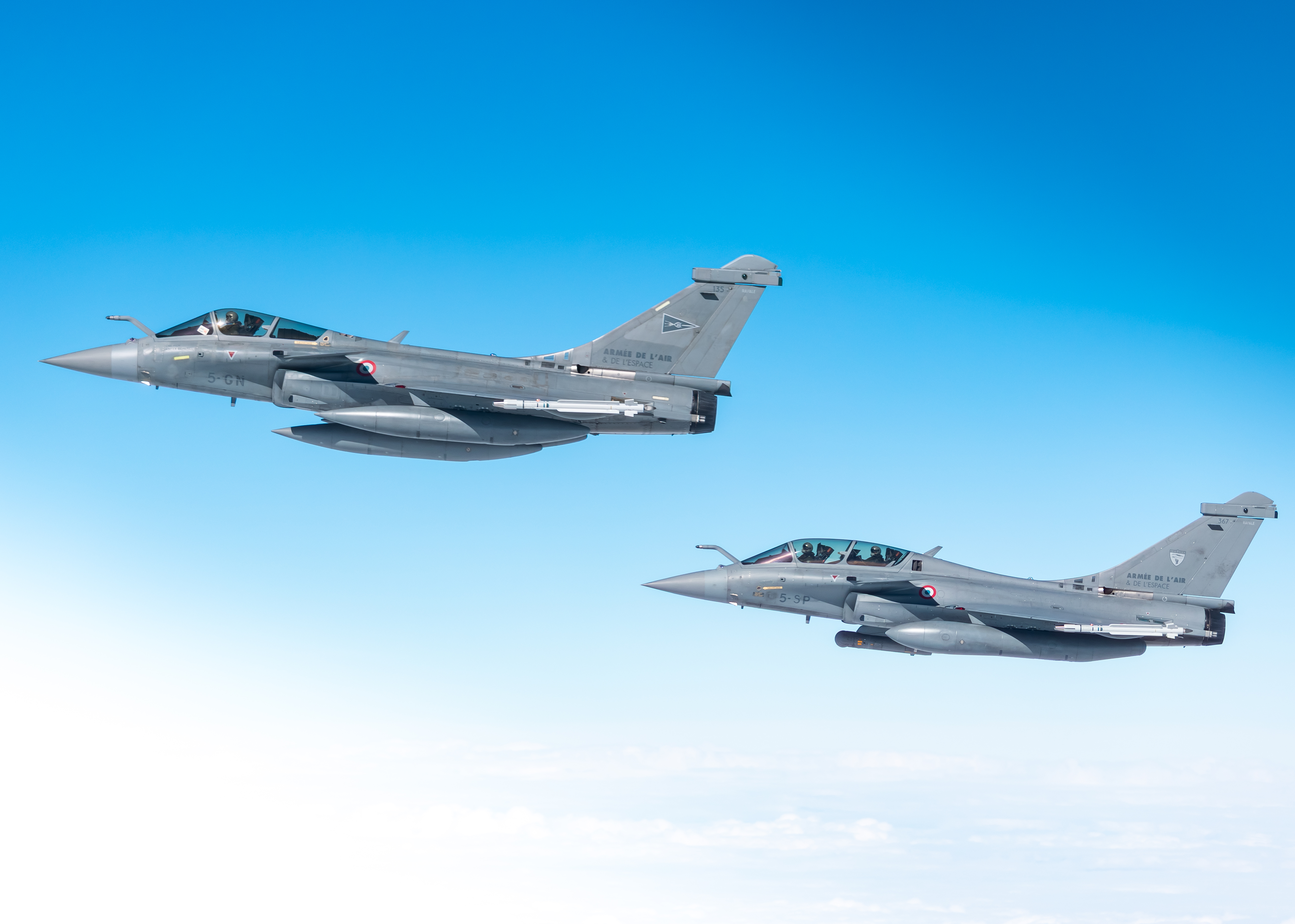 Two French Air and Space Force Dassault Rafale aircraft after refuelling from a RAF Voyager, during Exercise Ramstein Flag.