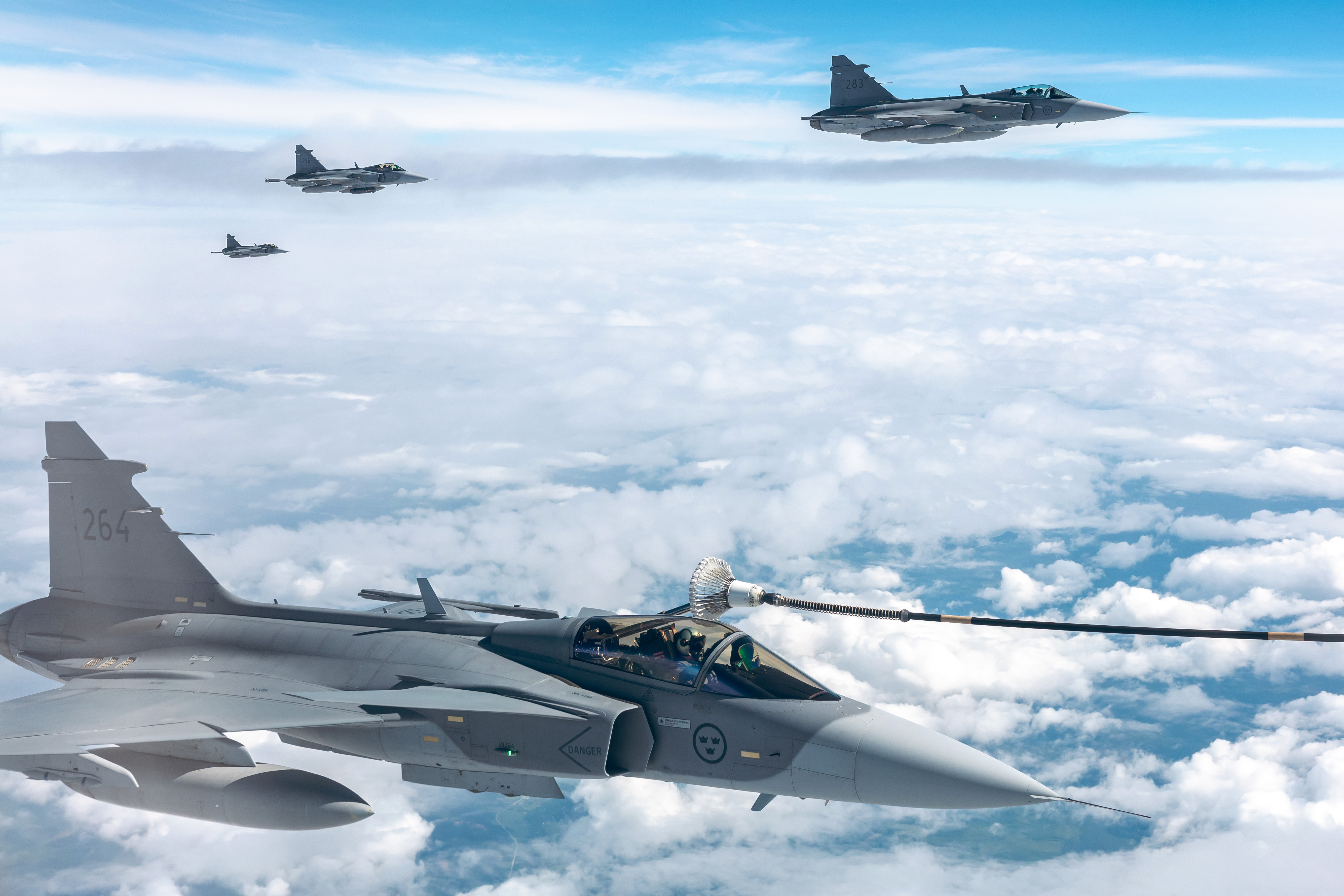 Four Swedish Air Force Gripens during refuelling from an RAF Voyager aircraft during Exercise Ramstein Flag.