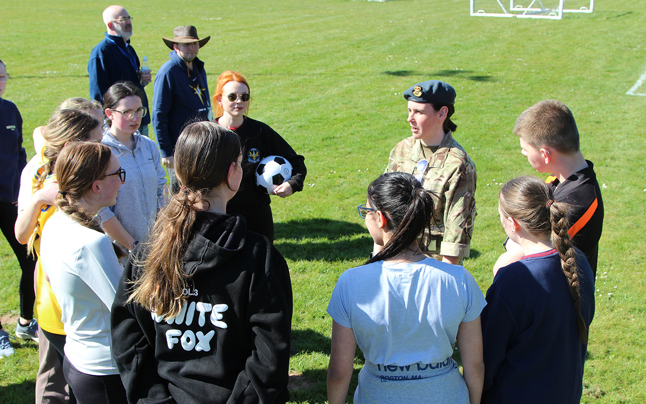 Cadets speaking with Wg Cdr Barton