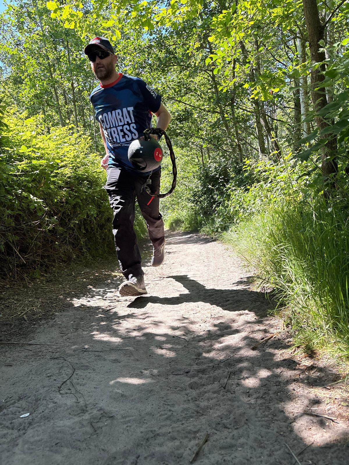CI McDowell running with medicine ball