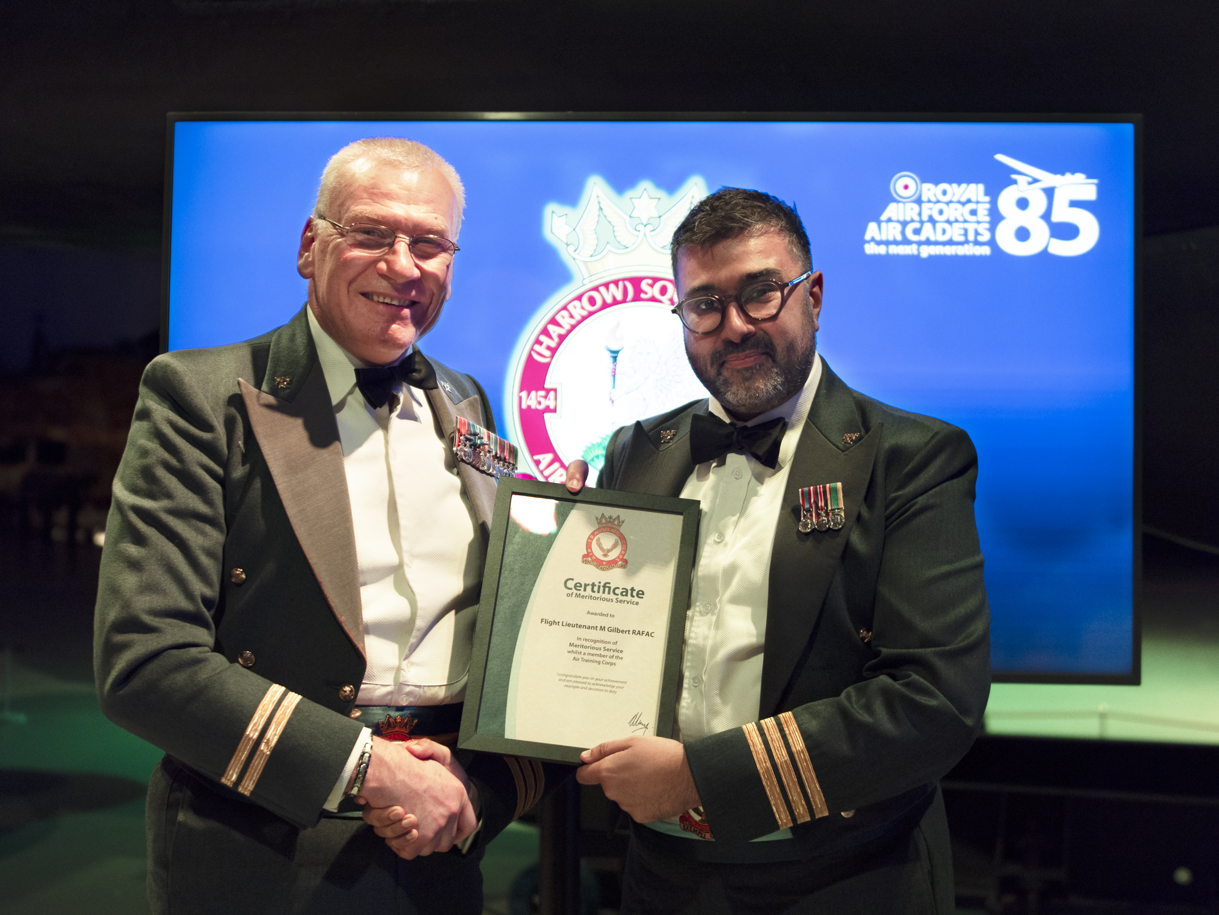 RAFAC Meritorious Service award being presented