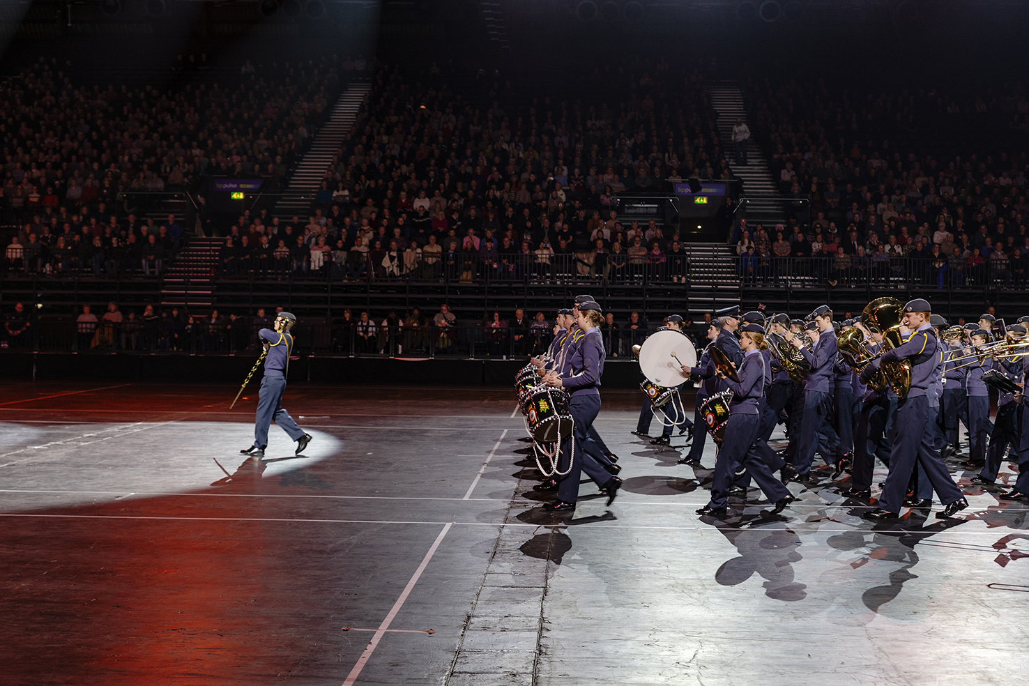band marching in front of the crowd