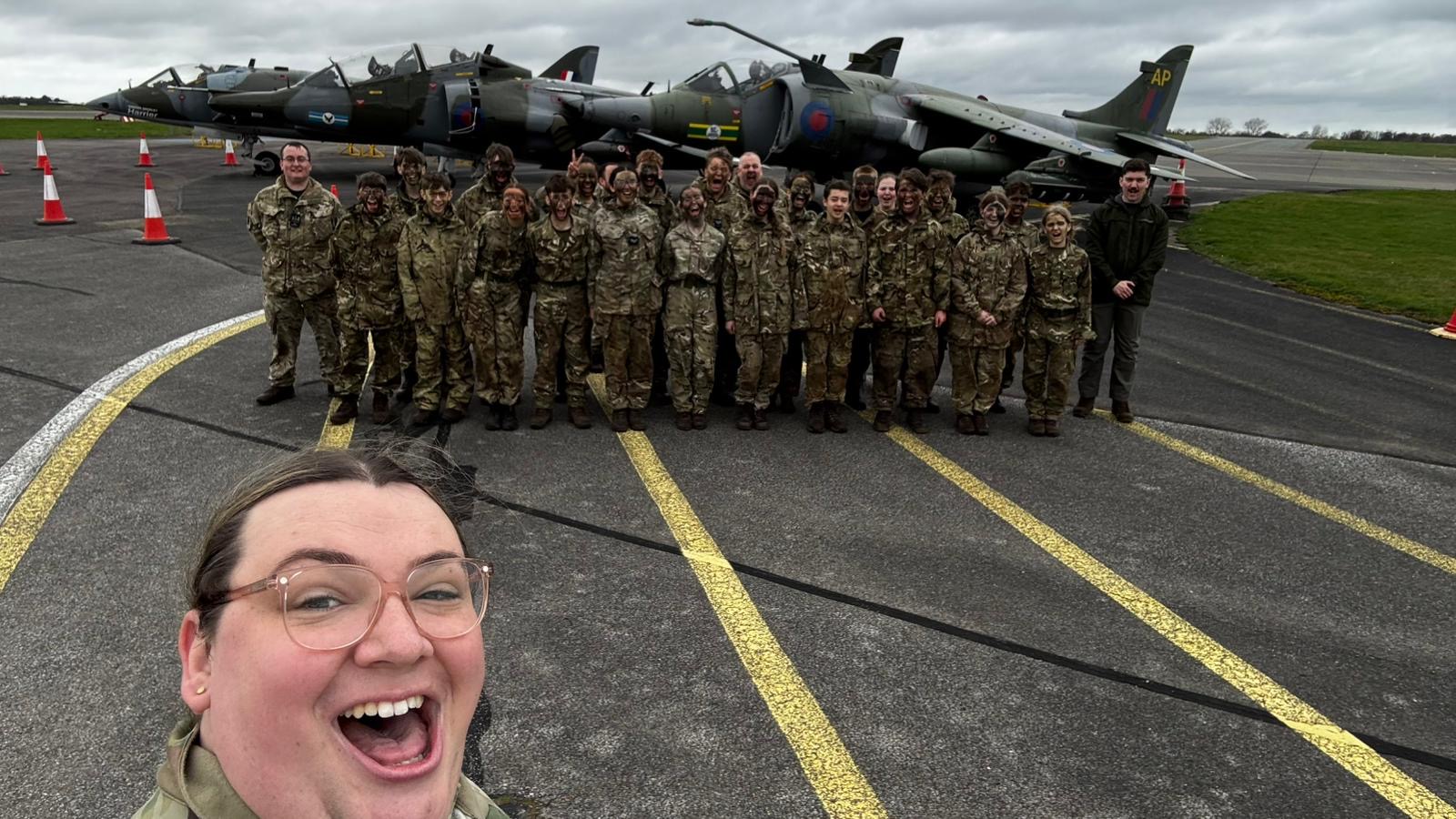 Cadet group in front of Harrier aircraft