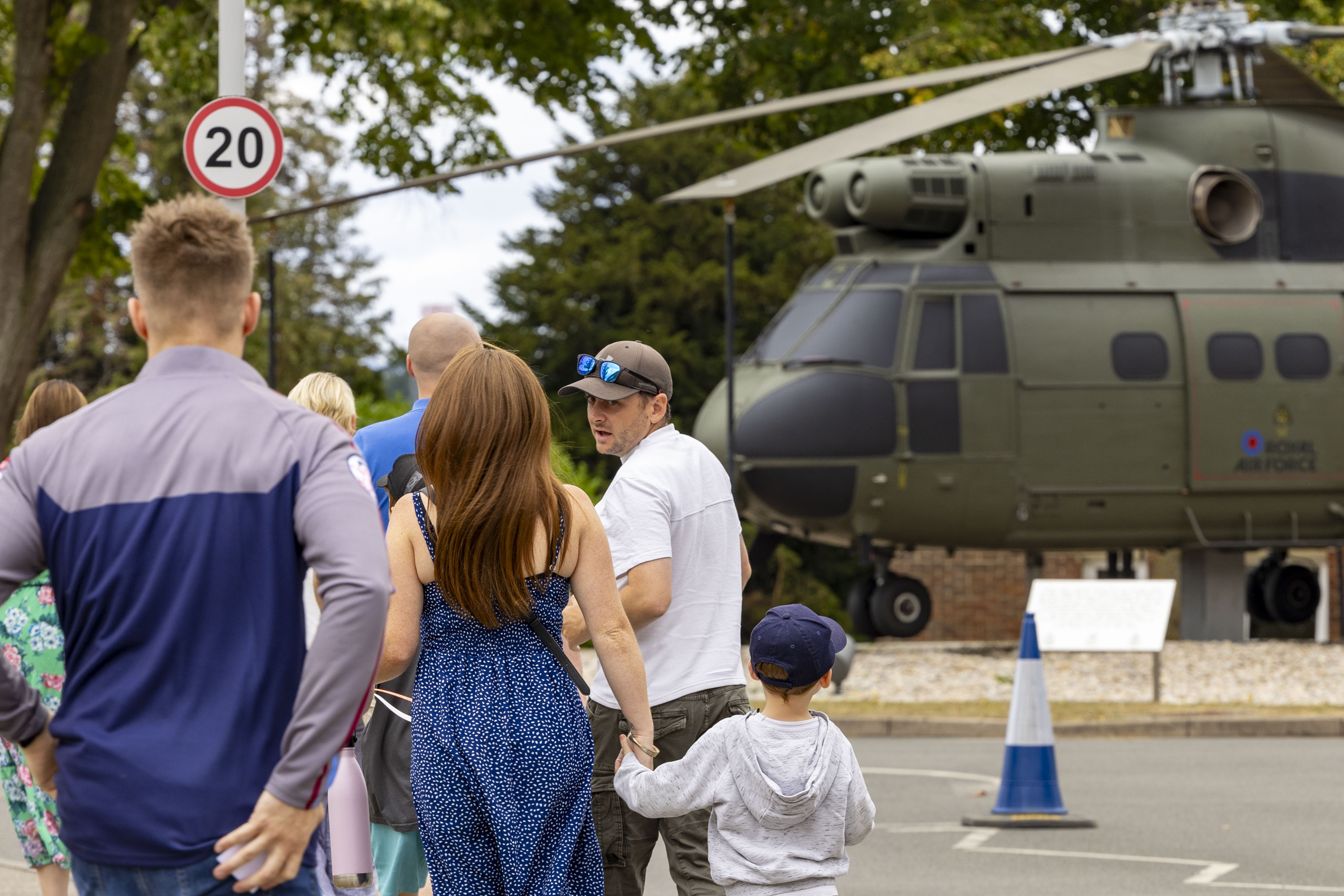 Families arriving at RAF Benson, greeted by the Puma gate guardian. 