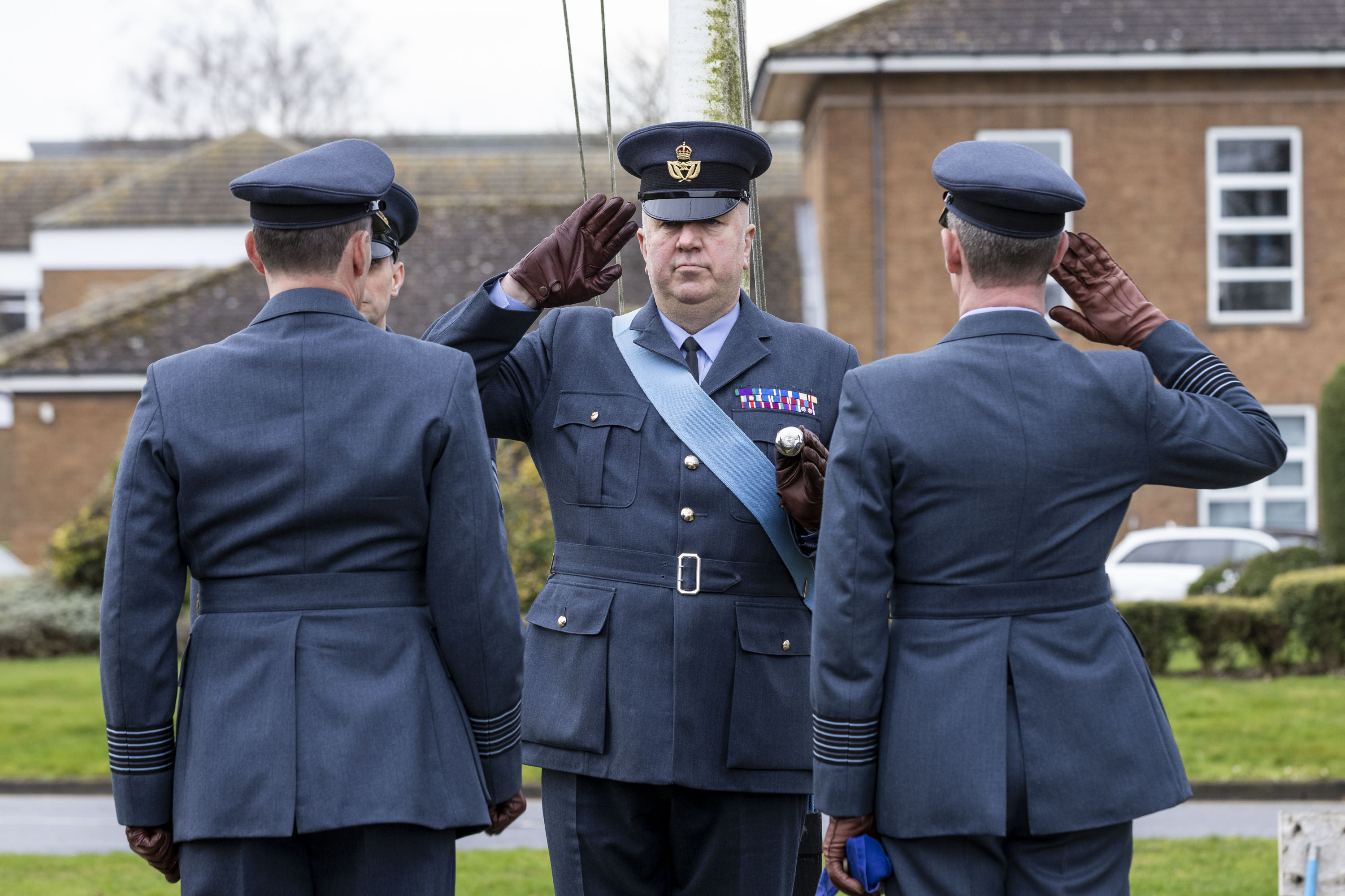 The two Station Commanders are saluted by the Station Warrant Officer. 