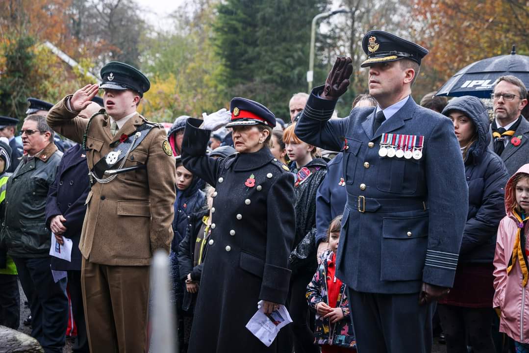 Group Captain Cameron Gibb taking the salute at Albrighton Remembrance Parade. 