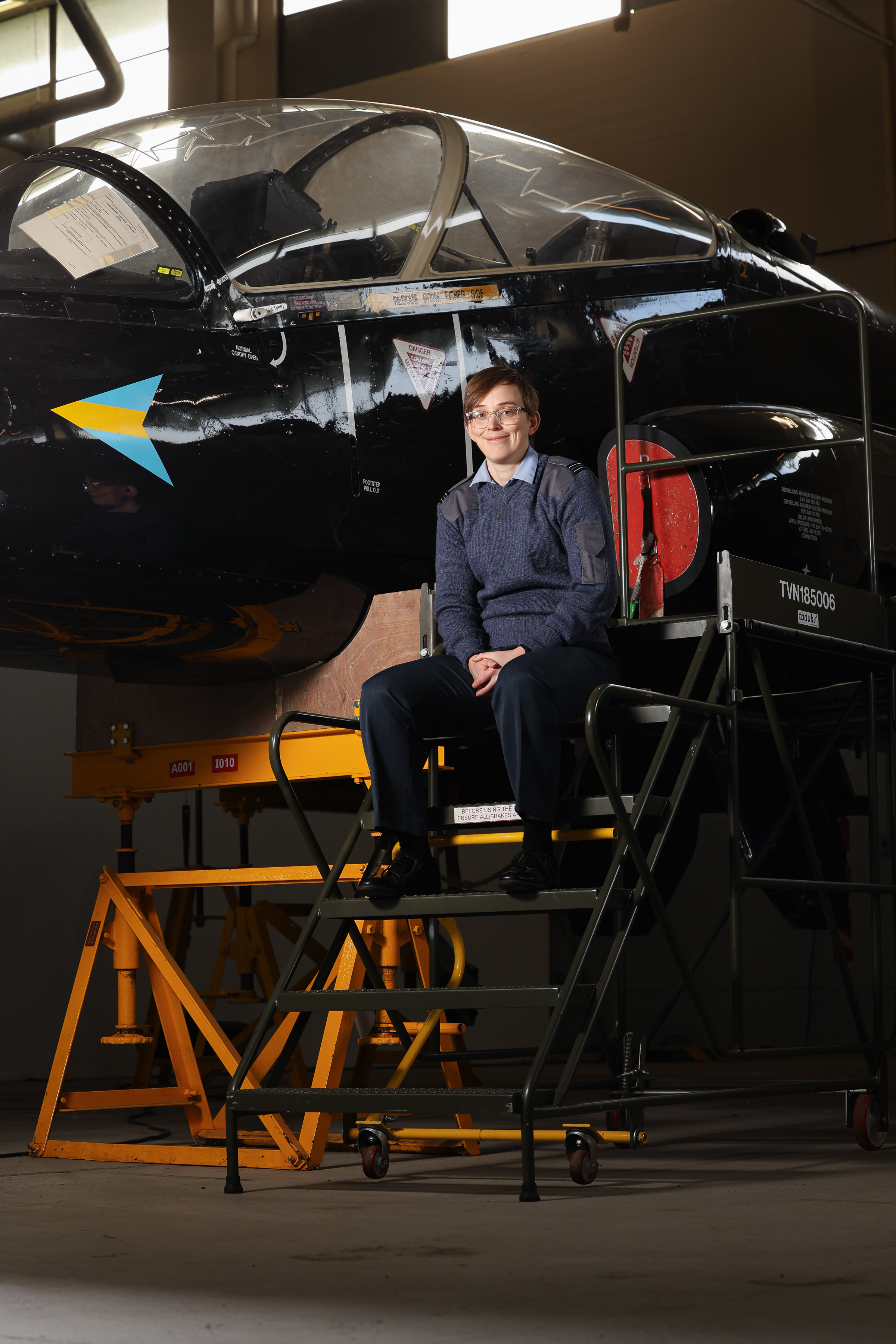 Flt Lt Christina Lane in front of a Jaguar aircraft within No1 S of TT