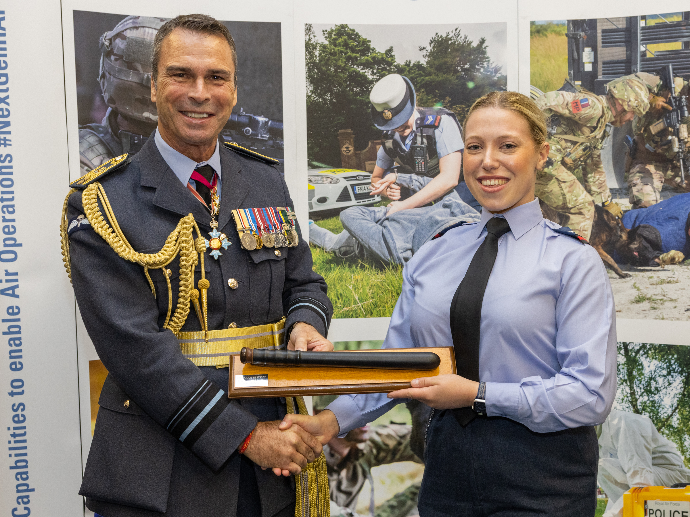 Air Vice Marshal Munro with Top Student Cpl Payne